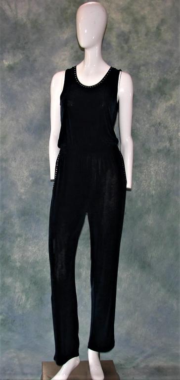1980s Vintage Jersey Jump Suit: By K.L.G. & Co. marked small, navy blue jersey with rhinestone details at the neck and pockets, elastic waist, flared small bellbottoms 61" L x 36" B x 24" W 34" inseam a lot of stretch to the fabric