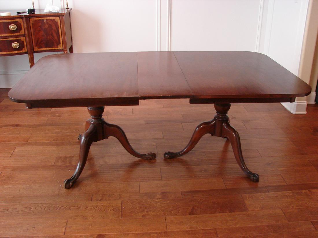 Duncan Phyfe Double Pedestal Dining Table: NOT SHIPPABLE. PICK-UP ONLY: with Claw and Ball Foot, three leaves, one leaf inserted 74" x 42" 28", one leaf in poor condition, leaves 12" x 42"