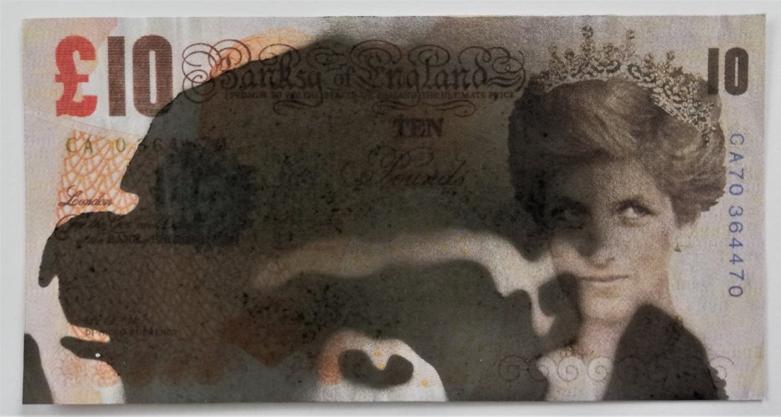 BANKSY (1974 -) DI Faced Tenner: LOT 11161 -- BANKSY (1974 -) -- Description : DI Faced Tenner -- Medium : Print in color with black spray paint -- Dimensions : 8 x 14.5 cm -- Estimate : 20 -30 Euro