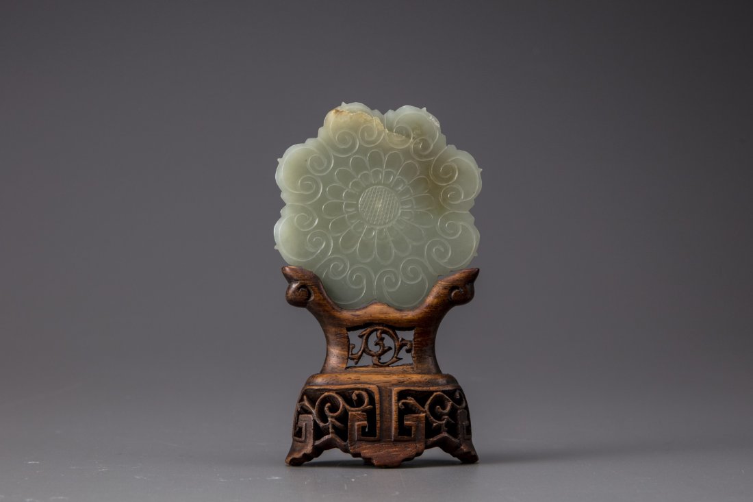A celadon jade floral plaque (1 of 4)