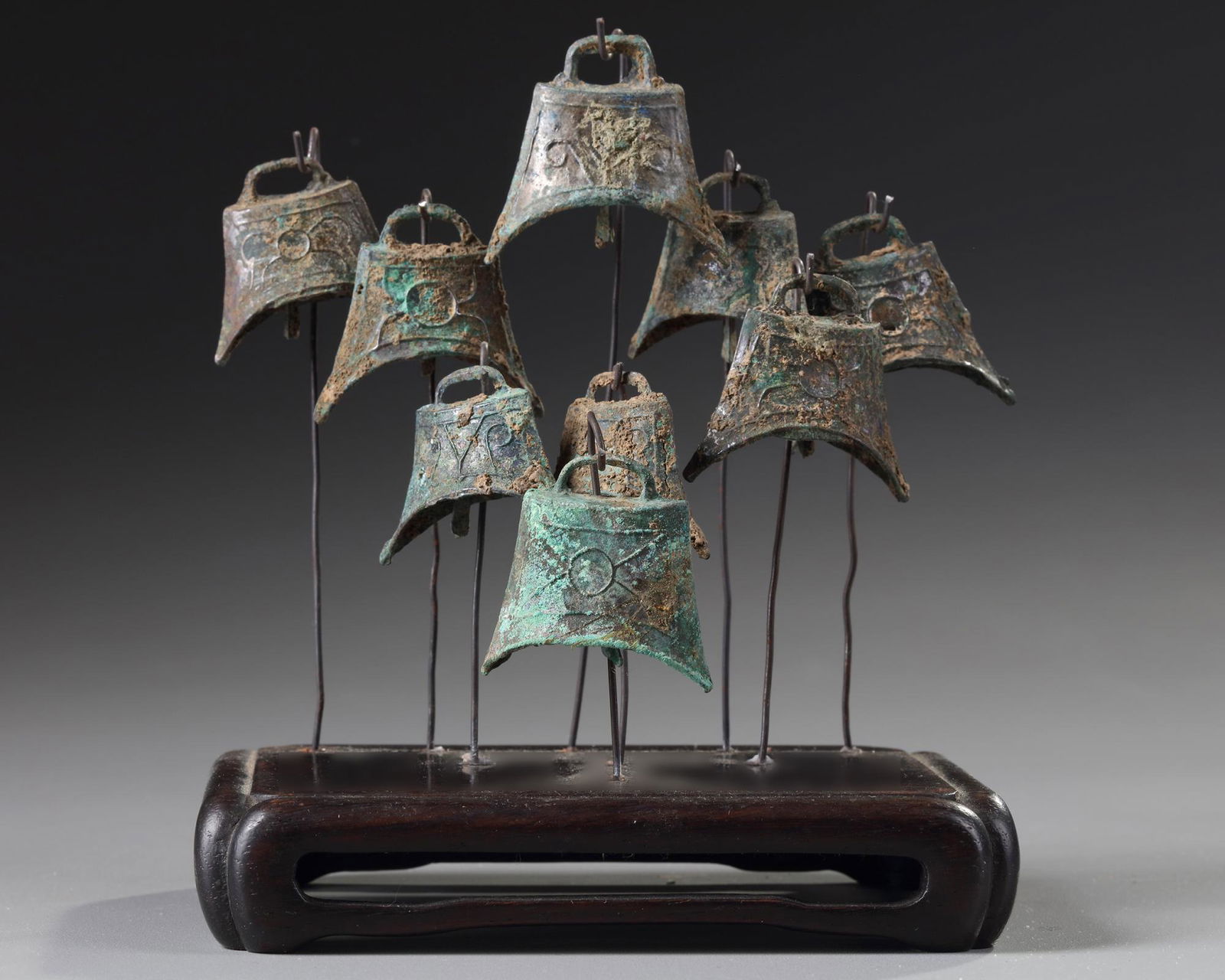 A set of nine Chinese bronze carriage bells (1 of 2)
