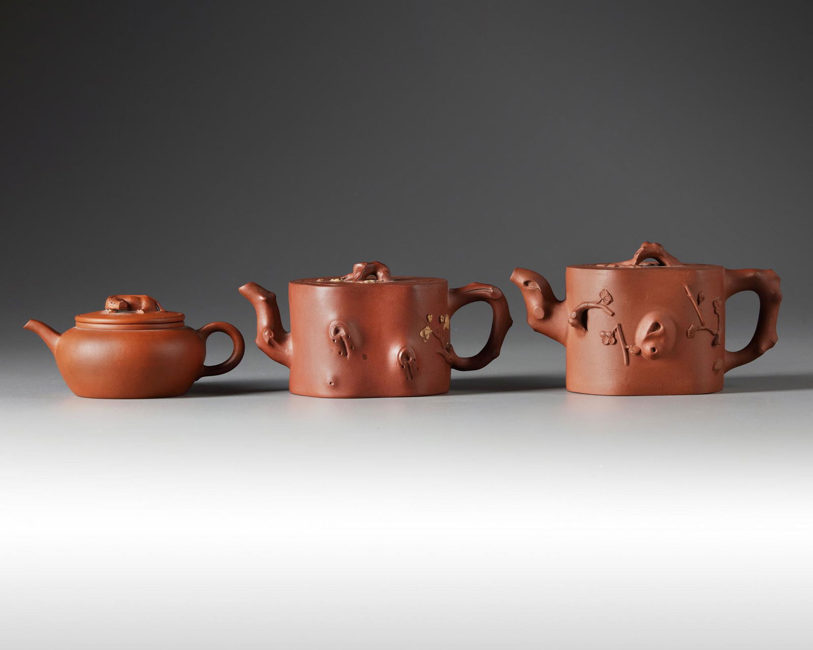 Three Chinese Yixing teapots and covers (1 of 5)
