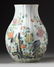 A CHINESE FAMILLE ROSE RIBBED VASE