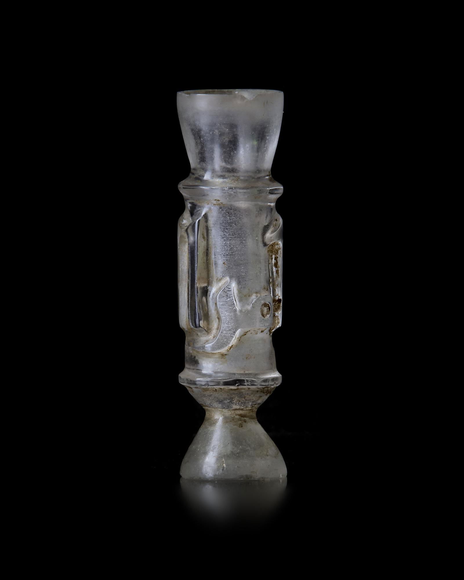 A FRAMENTARY FATIMID ROCK CRYSTAL MOLAR FLASK, EGYPT, (1 of 7)