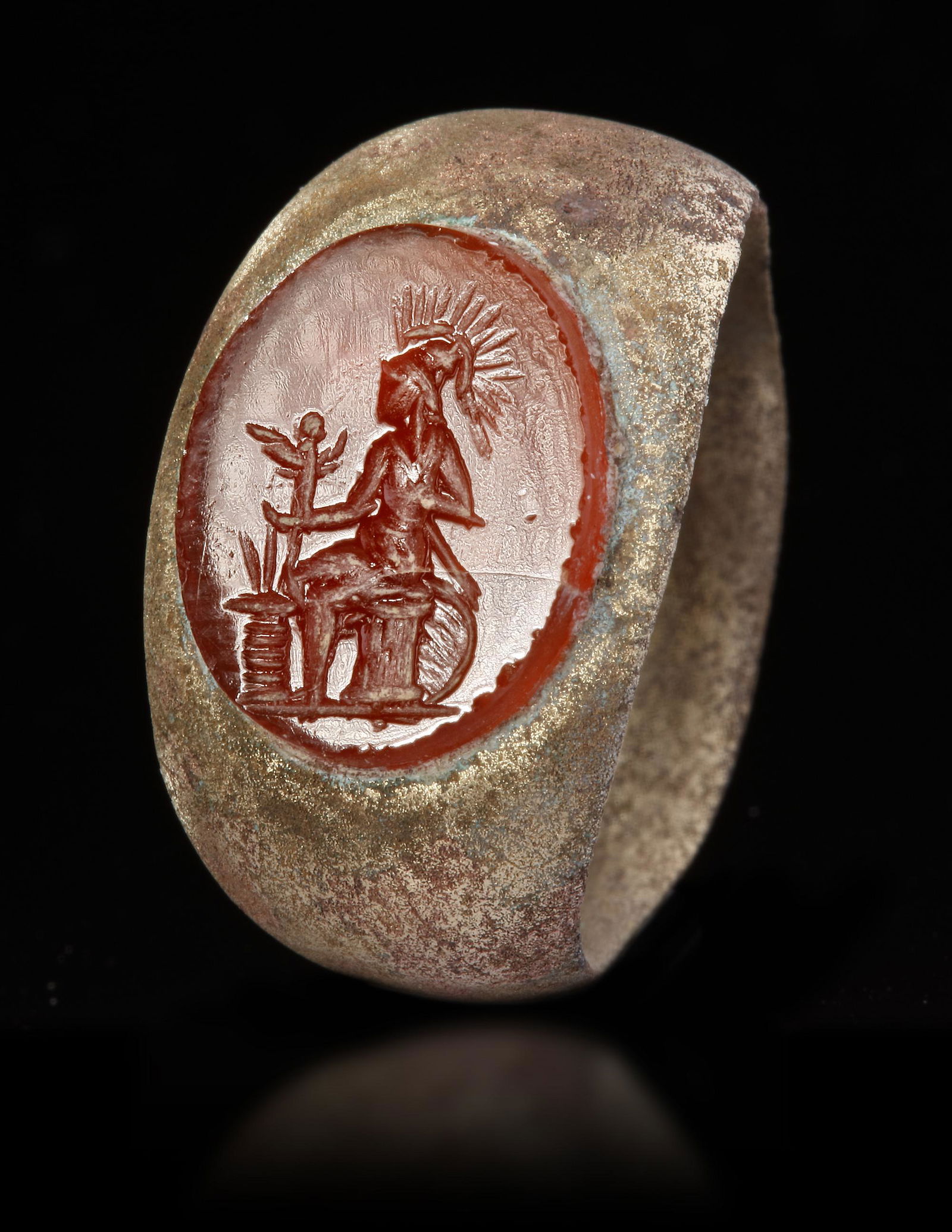 A ROMAN BRONZE RING WITH CARNELIAN INTAGLIO, CIRCA 2ND-3RD CENTURY A.D. (1 of 1)