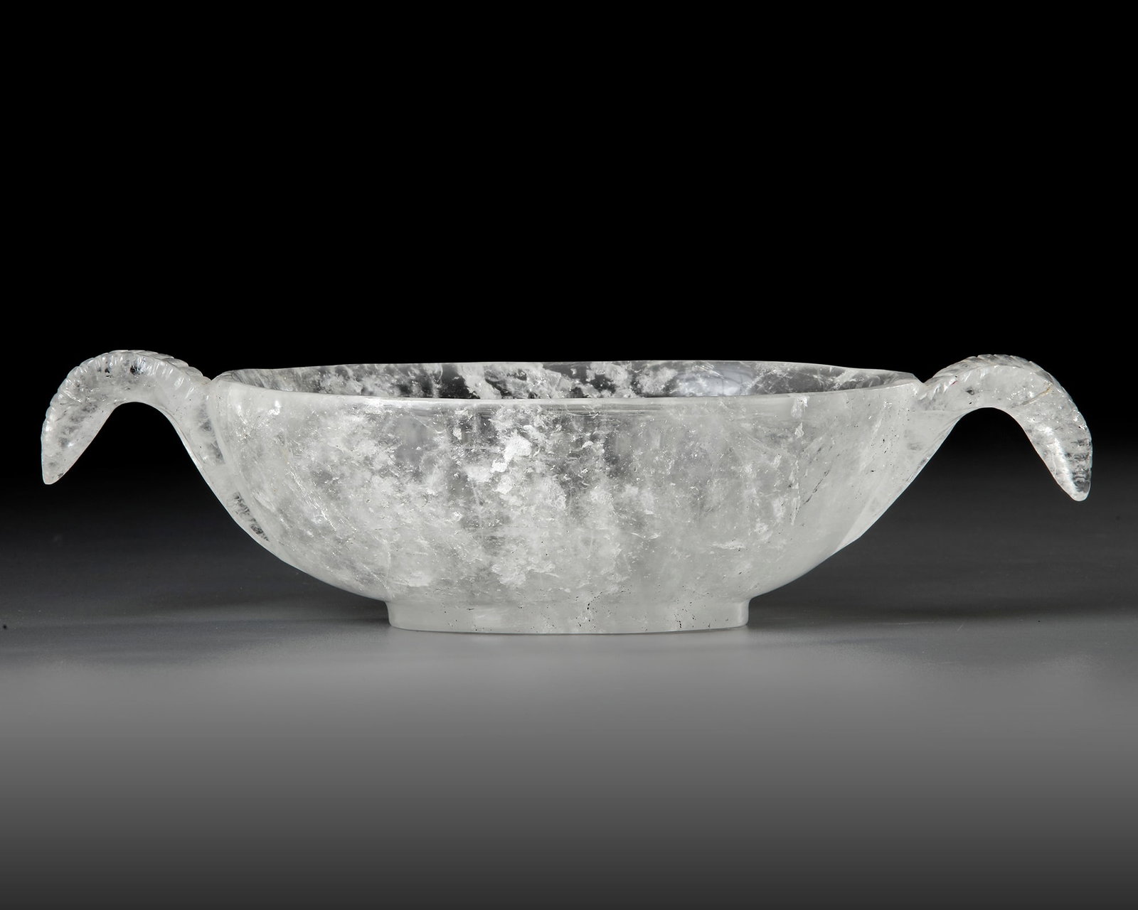 A MUGHAL CARVED ROCK CRYSTAL BOWL,20TH CENTURY: 27 cm.