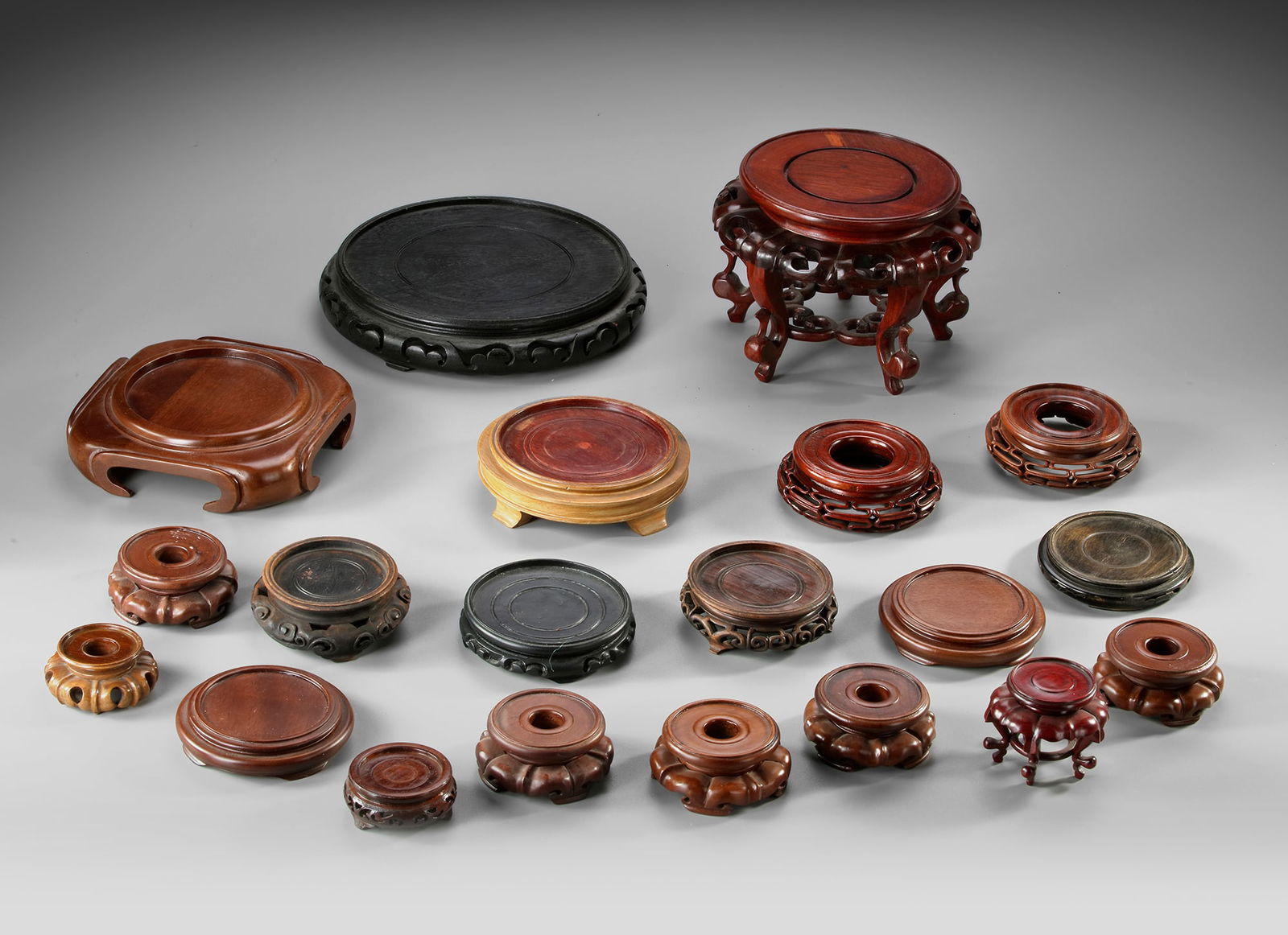 A COLLECTION OF FINE CHINESE WOODEN STANDS, 20TH CENTURY (1 of 2)