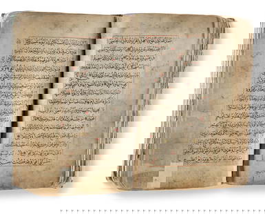 AN ILLUMINATED OTTOMAN QURAN, 16TH-17TH CENTURY: A complete Quran, Arabic manuscript on cream paper, 300 leaves, each page with 15 lines written in black naskh script within a red rule, red roundel verse markers, Surah headings in red thuluth script