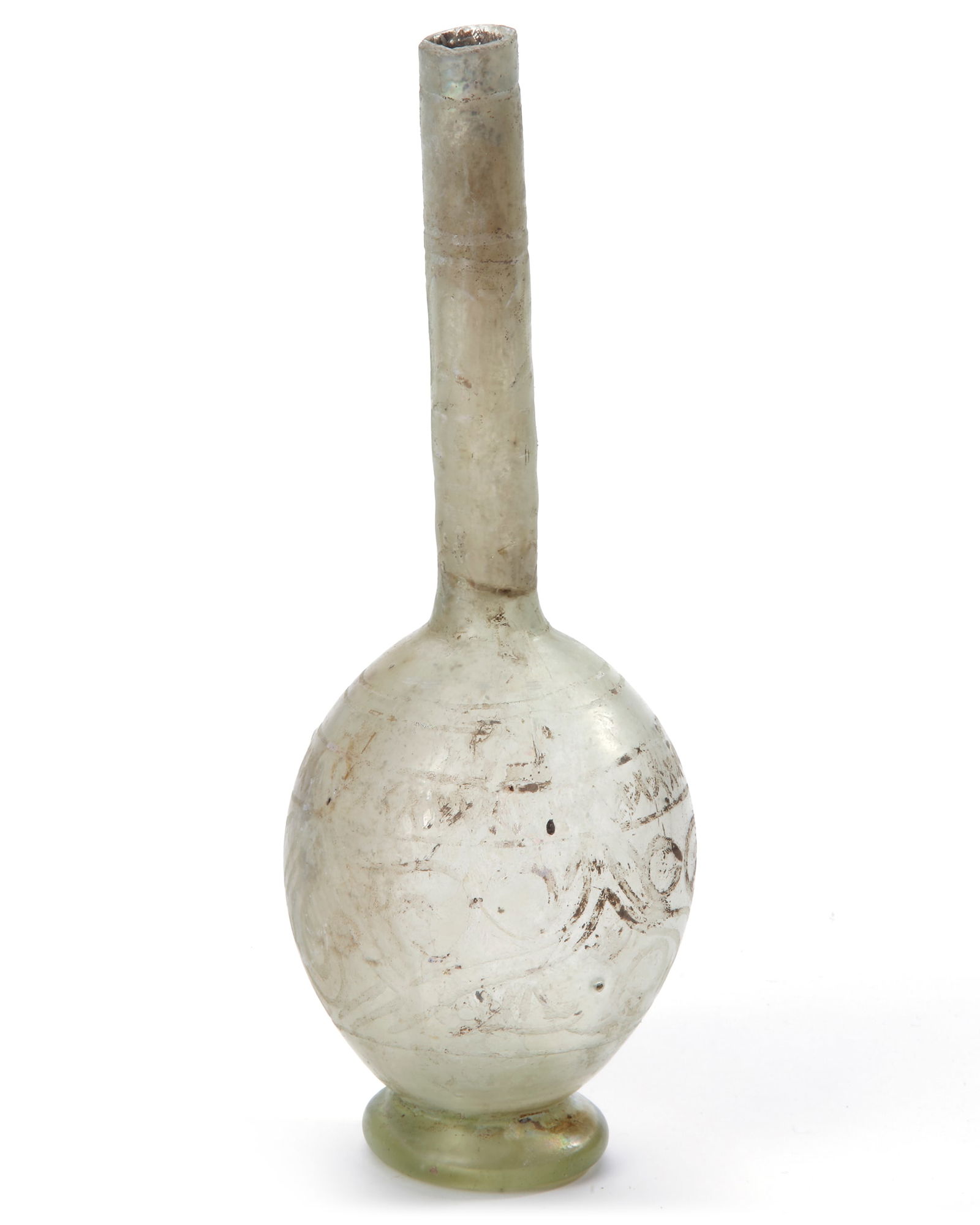 A PERSIAN GLASS BOTTLE, 13TH-14TH CENTURY: A Persian cut glass bottle, composed of clear glass, with elongated body and flaring mouth, with rings around the neck, decorated with rounded registers. Height 22.8 cm.