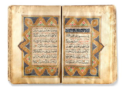 AN EARLY QAJAR ILLUMINATED QURAN, PERSIA, EARLY 19TH CENTURY: Arabic manuscript on paper, each folio with 11 lines of elegant largevblack naskh script, diacritics and vowels in red. Persian interlinear translation in red nastaliq, marginal occasional notes indic