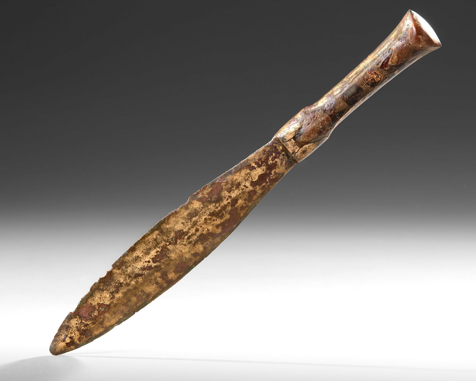 A BRONZE DAGGER WITH DECORATION, 800-500 BC: Length 25 cm.PROVENANCE Private collection, Germany before 1990.