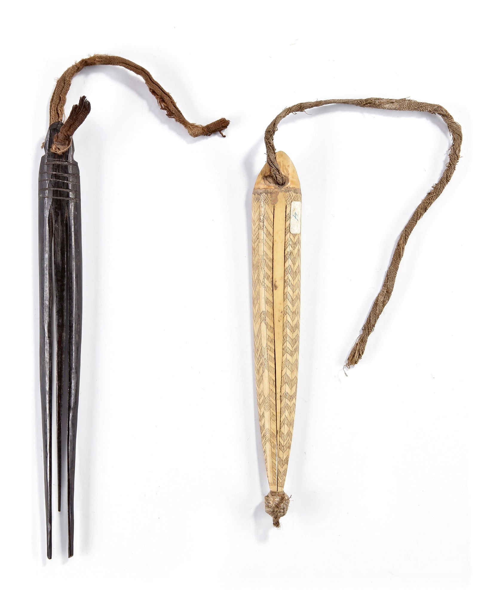 Highlands. Two mouth harps. Collected by Jac Hoogerbrugge before 1969: Highlands. Two mouth harps. Collected by Jac Hoogerbrugge before 1969. One with the Hoogerbrugge collection number, the other drawn by Hoogerbrugge. Hoogerbrugge writes: nice dark patina.ca. 24 cm.