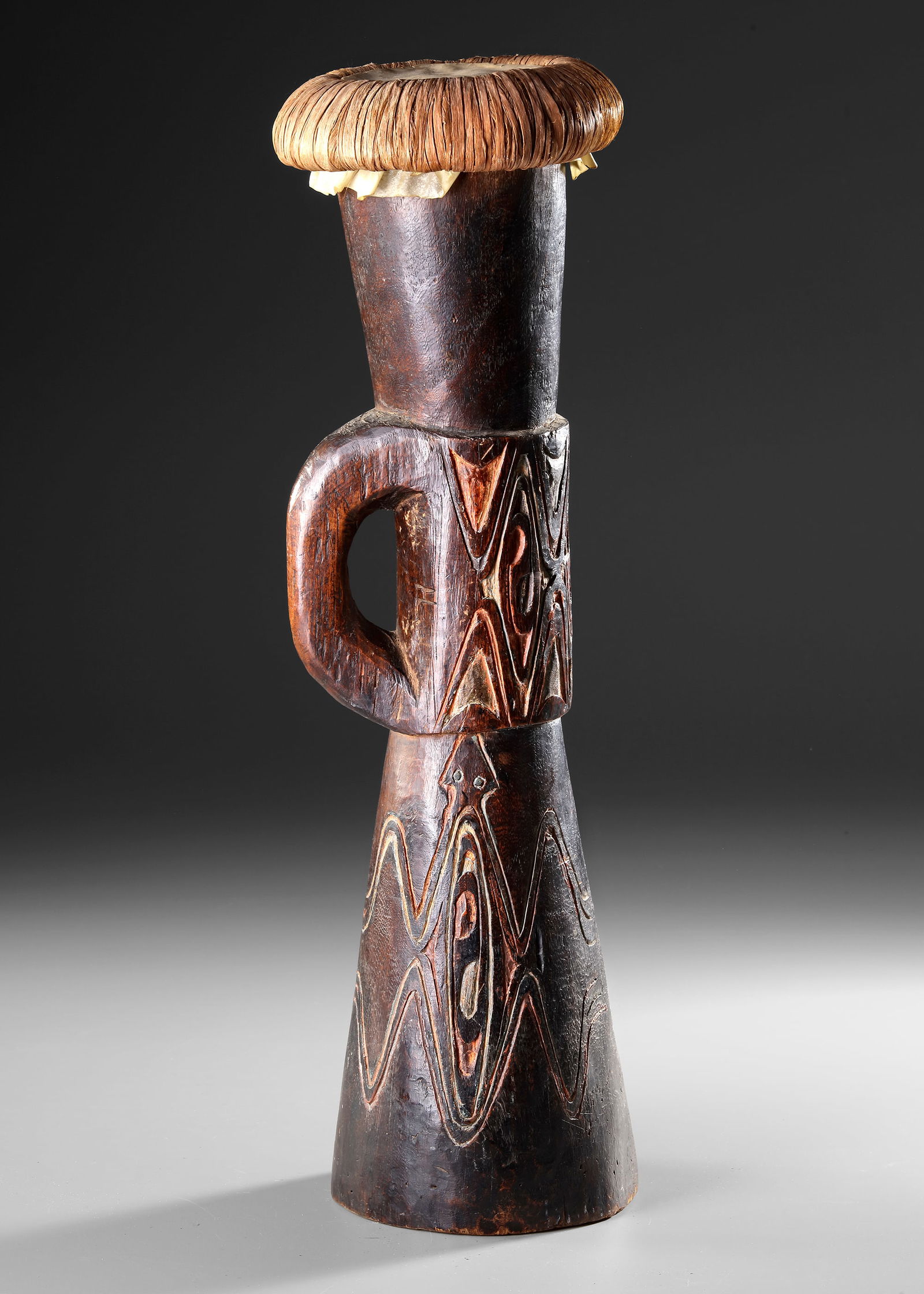 Small Sentani drum. Collected by Jac Hoogerbrugge in the 1950’s.: D. 14 cm. H. 50 cm.