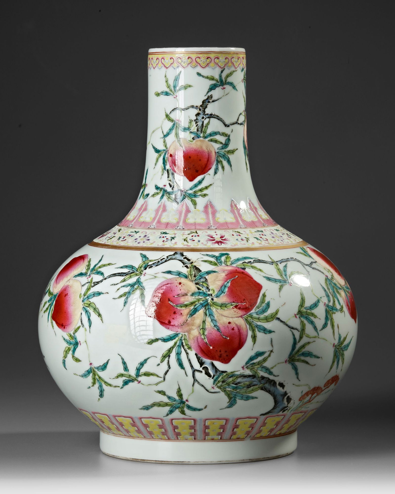 A CHINESE FAMILLE ROSE BOTTLE VASE, QING DYNASTY (1644-1912) (1 of 4)