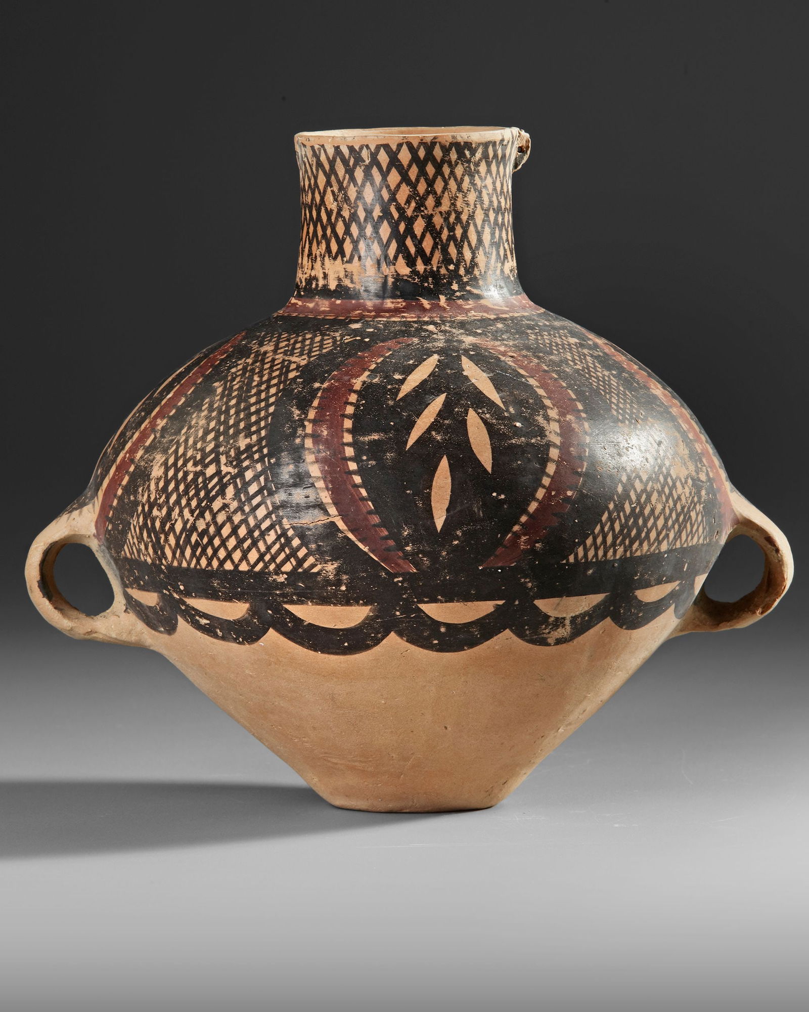 A CHINESE PAINTED POTTERY JAR, NEOLITHIC PERIOD, BANSHAN CULTURE, GANSU PROVINCE, 3RD MILLENNIUM BC (1 of 3)