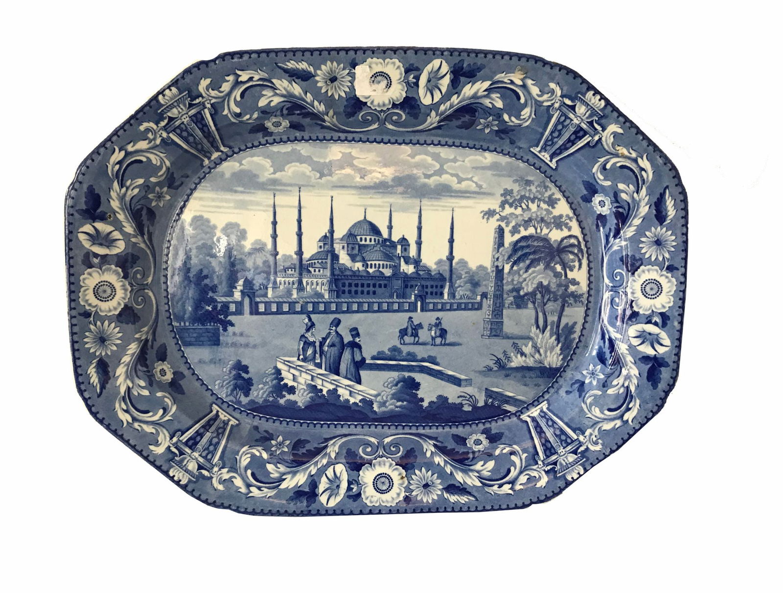 A DON POTTERY BLUE AND WHITE TRANSFER WARE CHARGER, FIRST HALF 19TH CENTURY: A Don Pottery blue and white transfer ware charger 1st half 19th century, from the Ottoman Empire series, printed with figures standing on a balcony overlooking a palace with parkland between, with fi