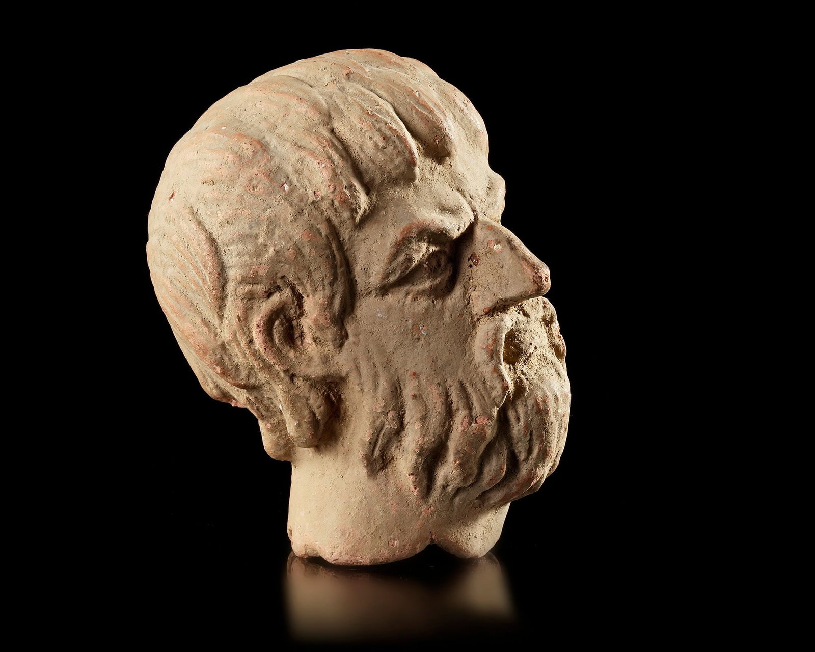 A POTTERY HEAD OF A BEARDED MAN, POSSIBLY BYZANTINE PERIOD (1 of 6)