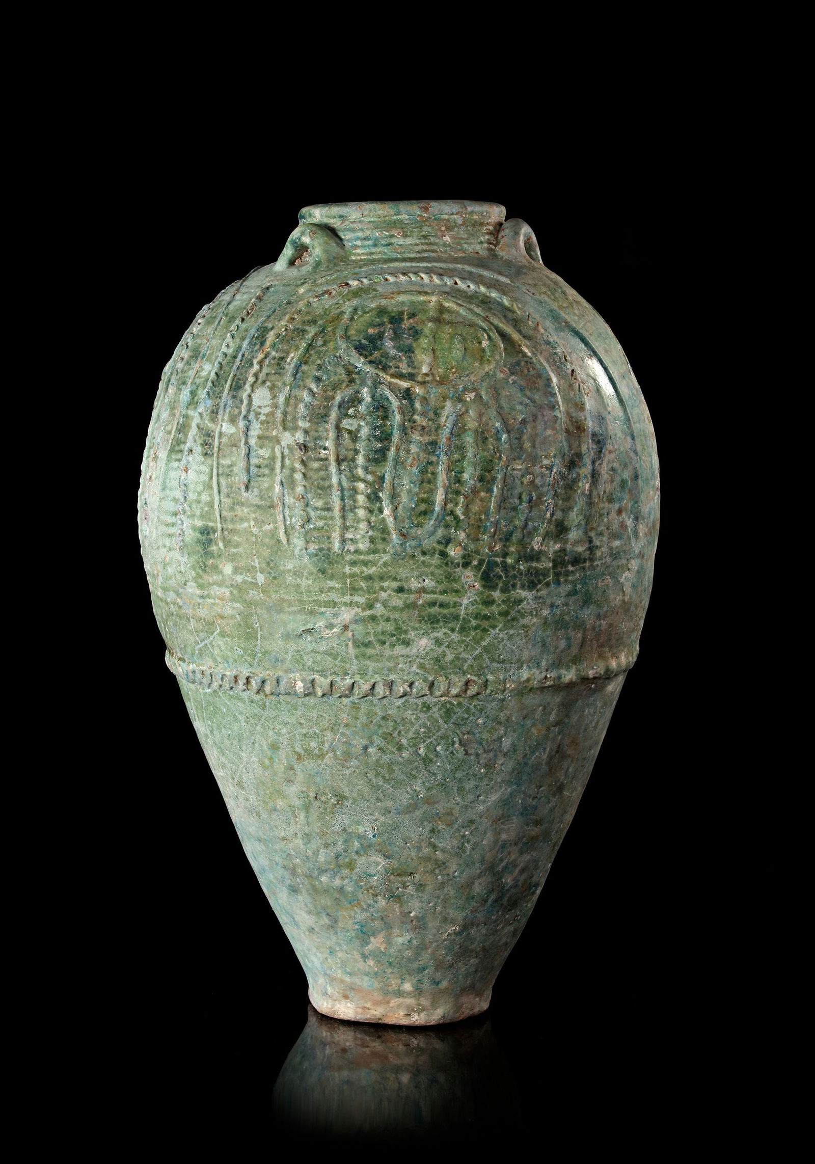 A LARGE UMAYYAD TURQUOISE-GREEN GLAZED JAR, MESOPOTAMIA, 7TH-8TH CENTURY (1 of 5)