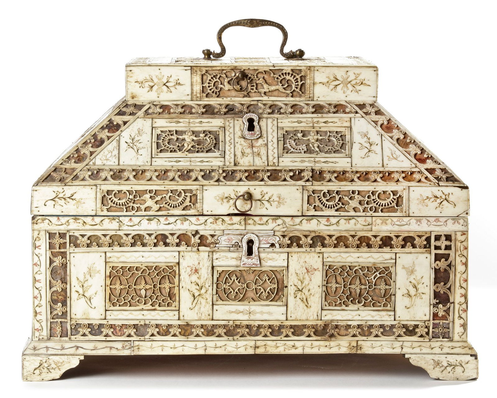 A KHOLMOGORY SCHOOL CARVED BONE BOX WITH MUGHAL INFLUENCE, 18TH CENTURY: An important carved bone box, pierced, engraved and colored with square shaped mica sheets, the lid with sloping shoulders. The whole is richly carved with openwork plaques, which are heavily- inspire