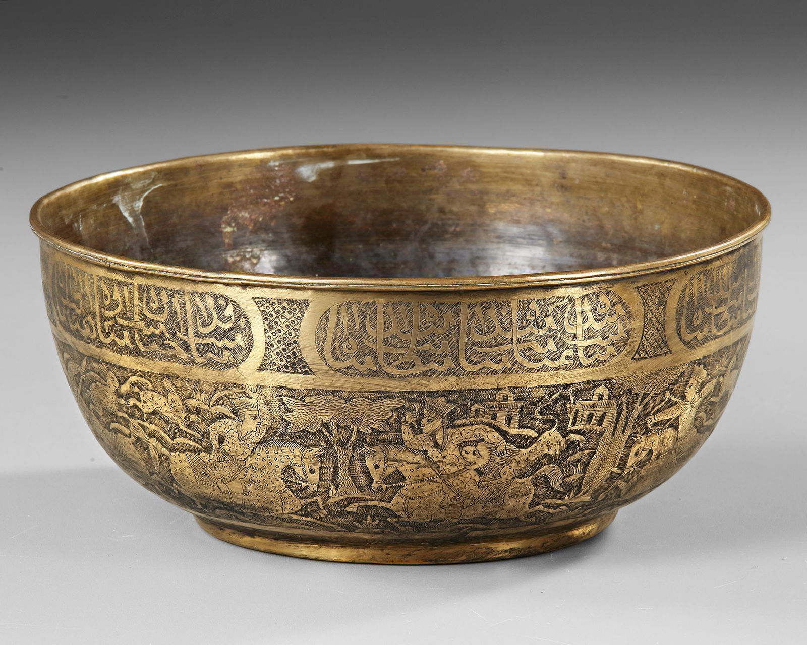 A QAJAR ENGRAVED BRASS BOWL, PERSIA, 19TH CENTURY (1 of 4)