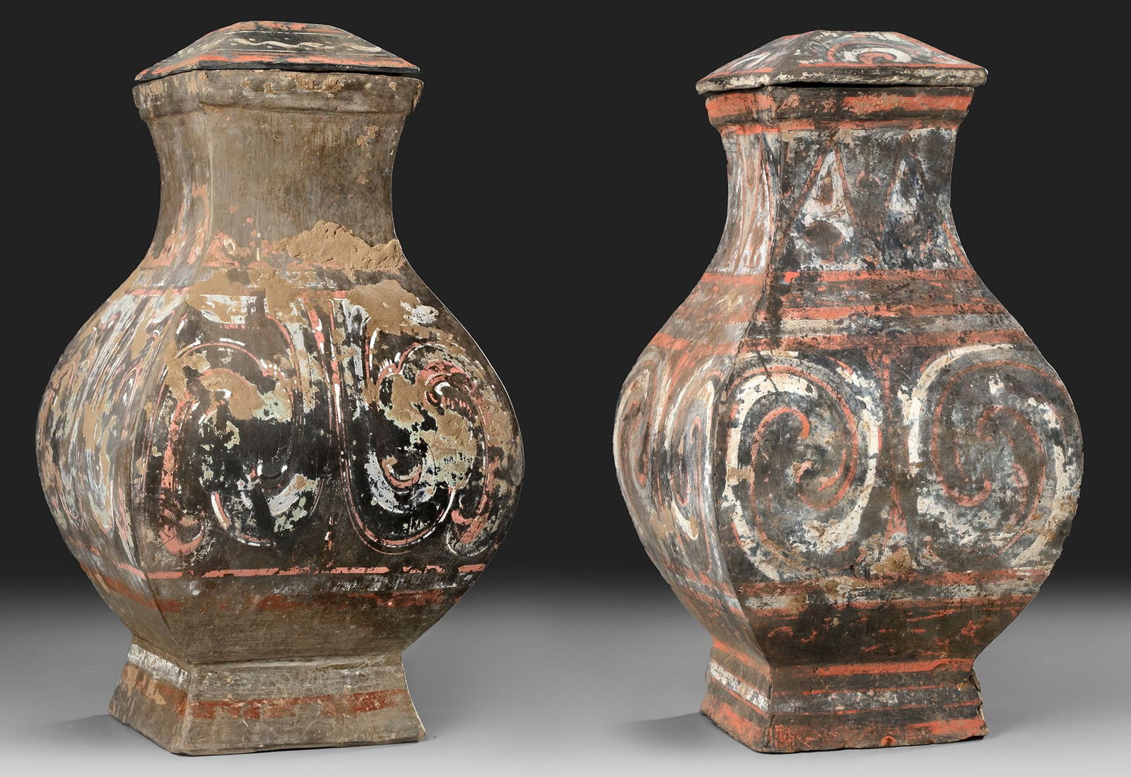 A PAIR OF CHINESE POTTERY 'FANG HU' VASES, HAN DYNASTY (206 BC-220 AD) (1 of 10)