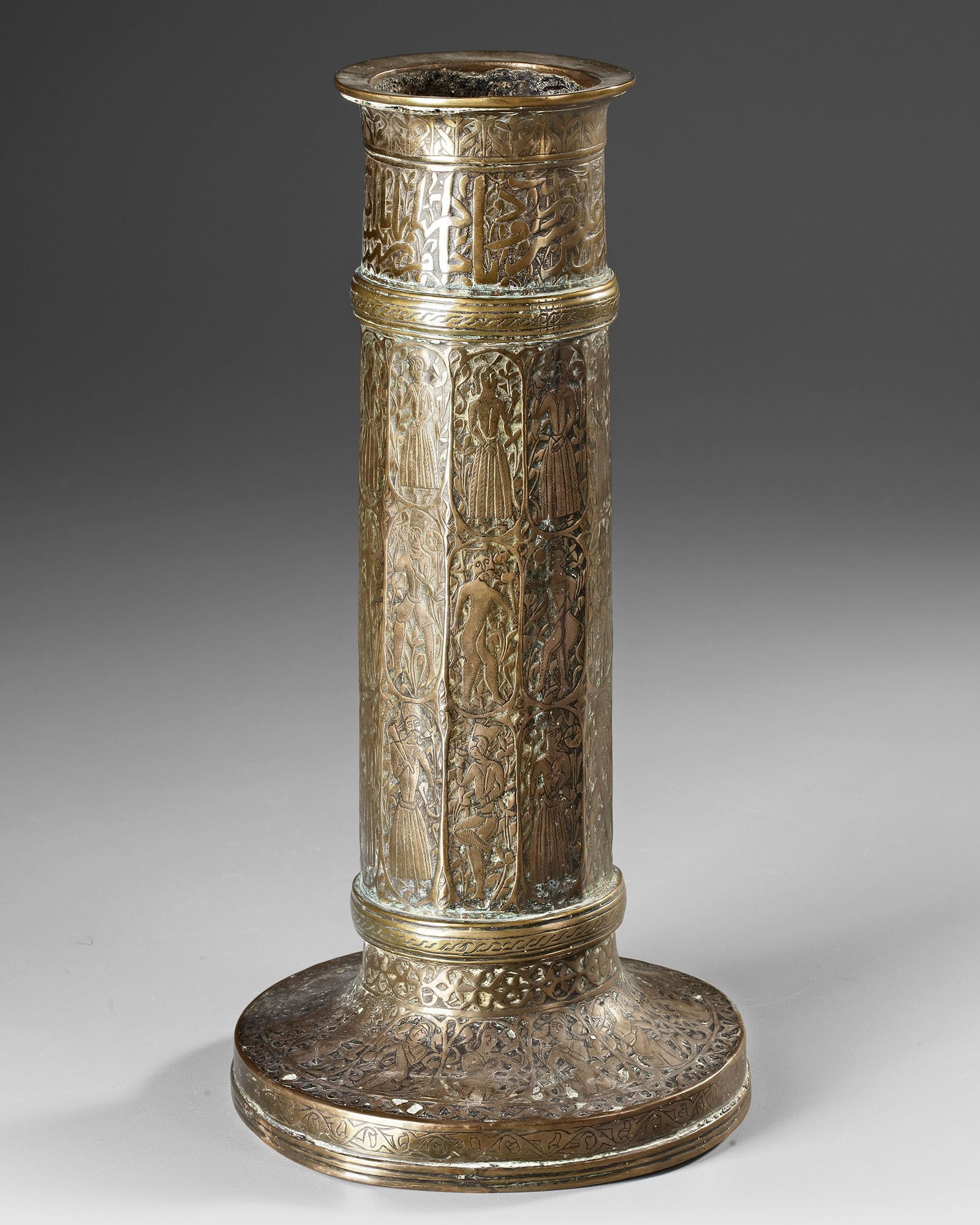A QAJAR BRASS TORCH STAND, PERSIA, 19TH CENTURY (1 of 4)