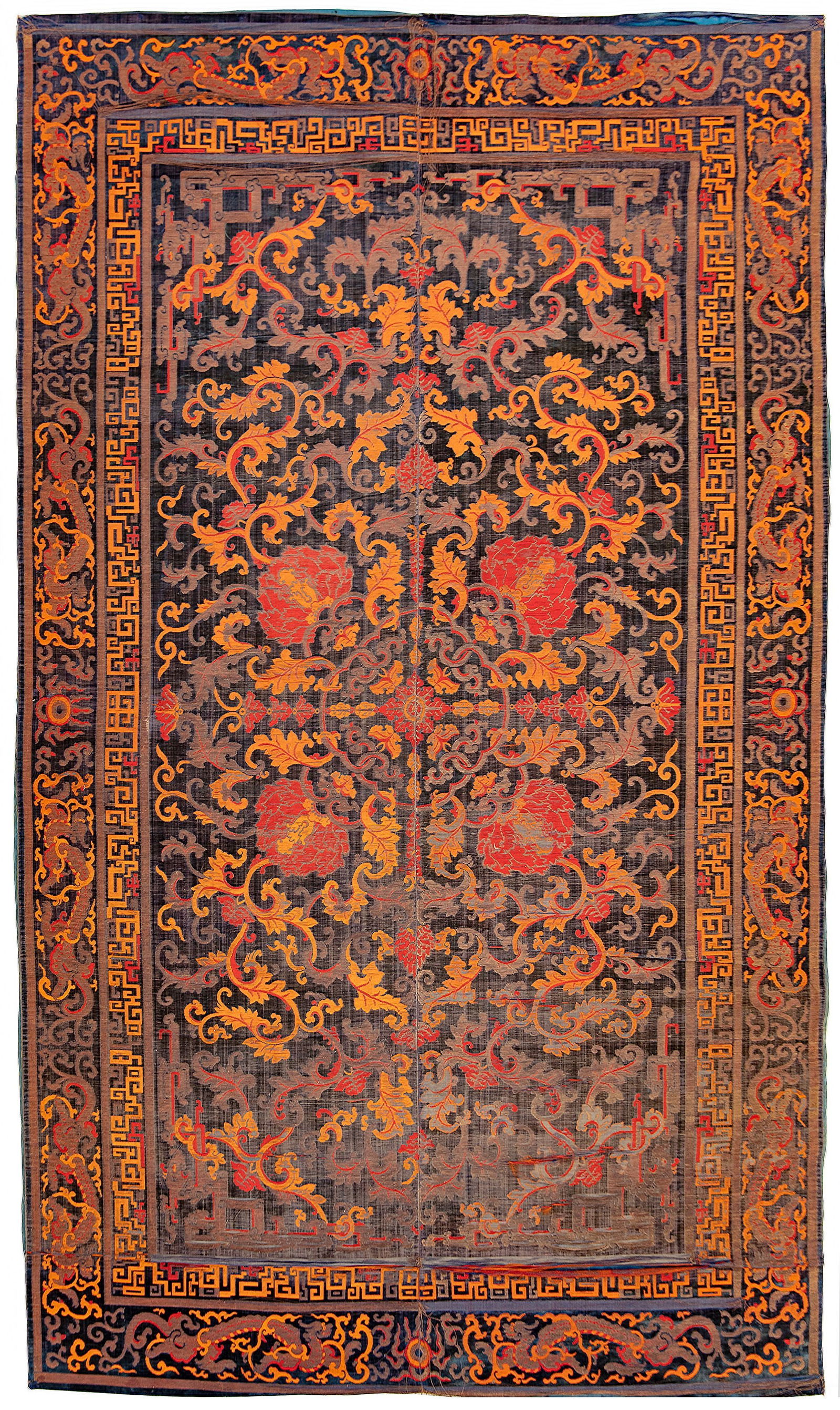 A RARE CHINESE CARPET WITH DRAGONS AND LOTUS, LATE MING DYNASTY (1 of 2)