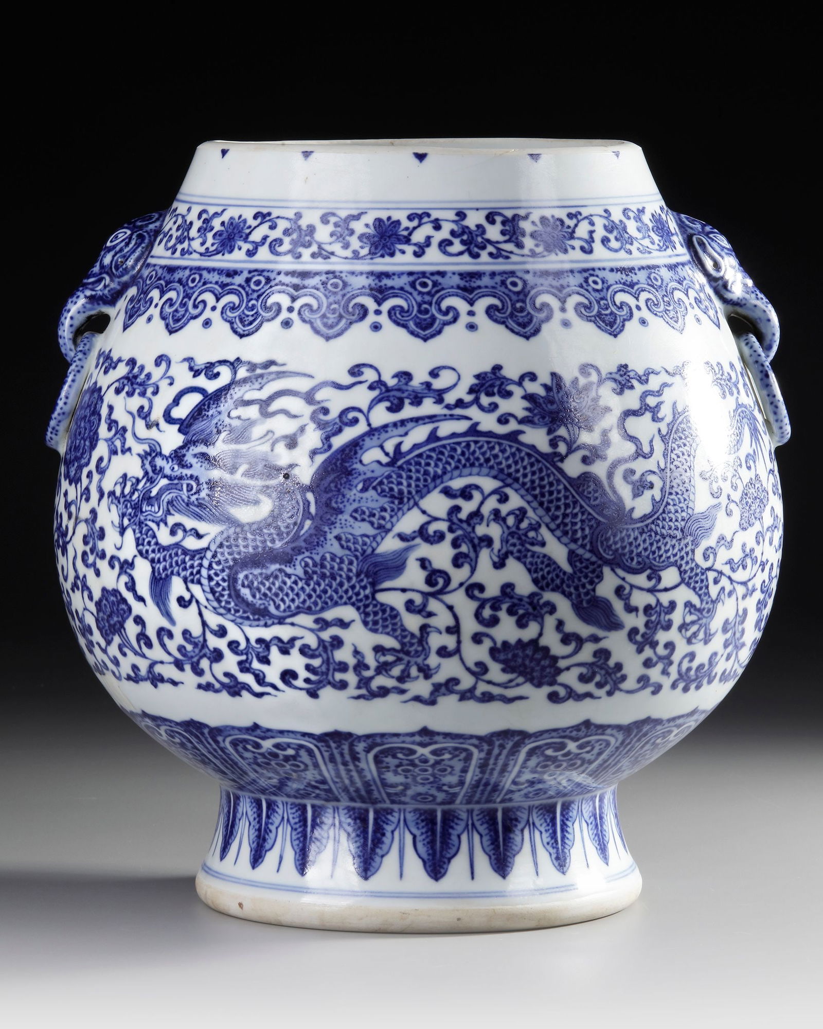 A CHINESE BLUE AND WHITE DRAGON VASE, QING DYNASTY (1644-1911) (1 of 5)