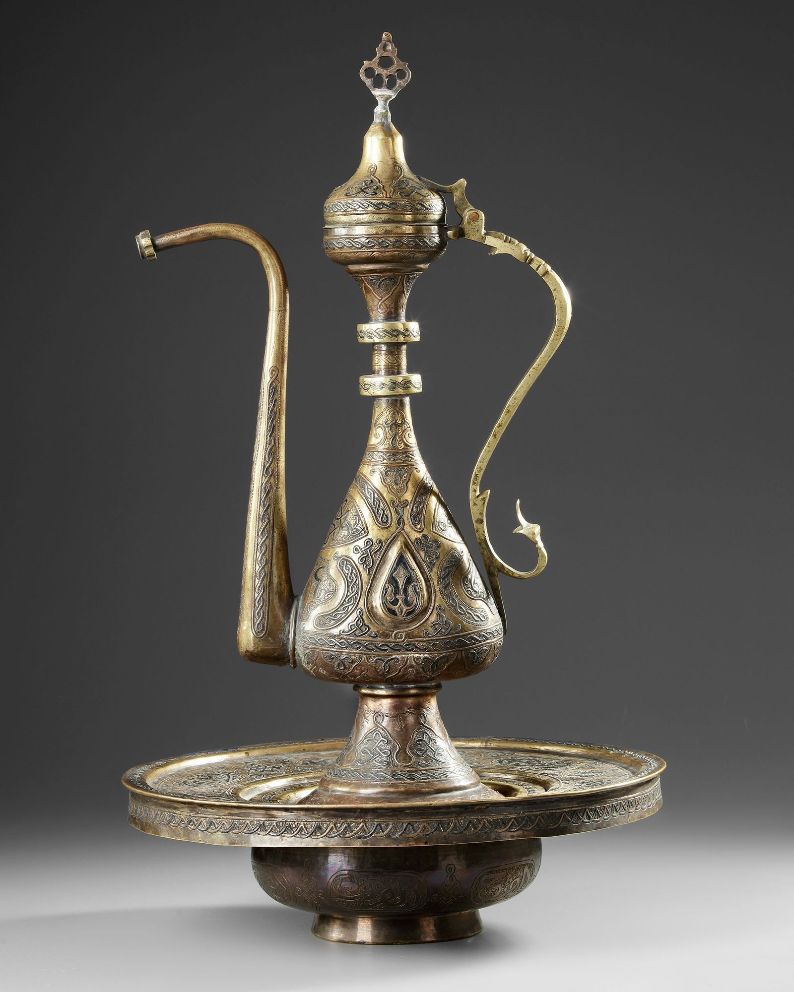 A CAIRO-WARE COPPER EWER AND BASIN, EARLY 20TH CENTURY (1 of 4)