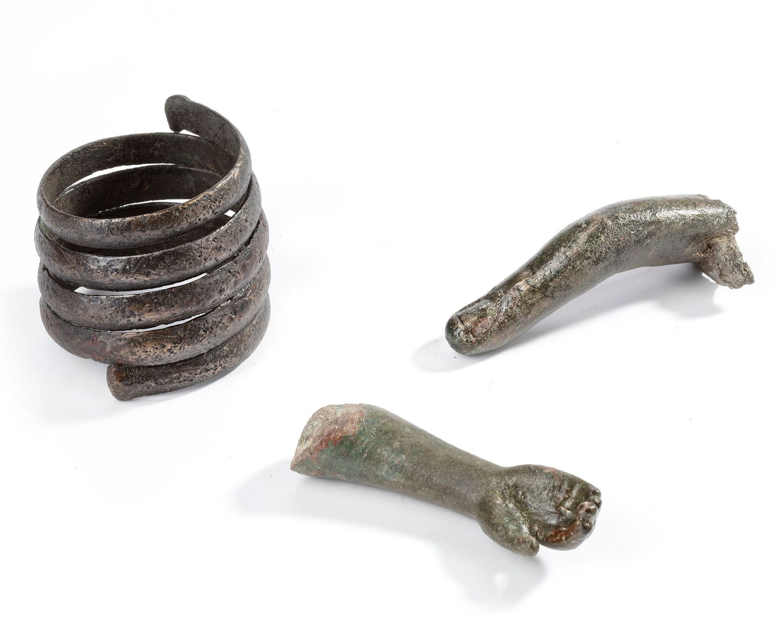 A GREEK BRONZE BRACELET, 2ND CENTURY BC AND ROMAN BRONZE FINGER AND ARM, 3RD CENTURY AD (1 of 2)
