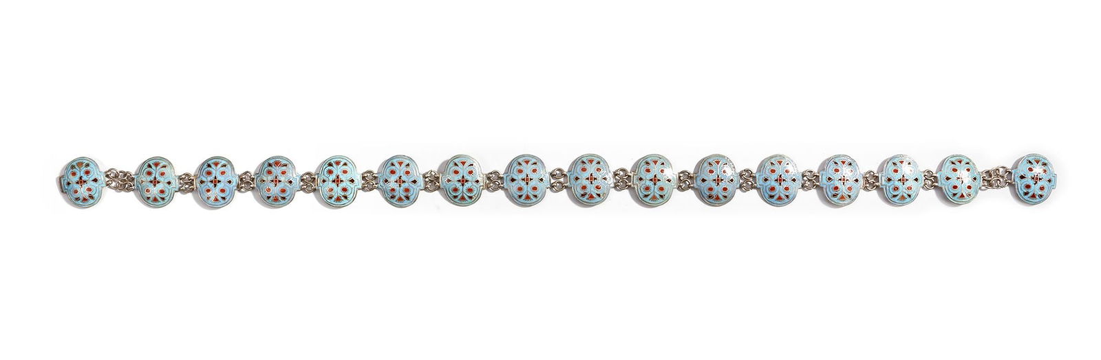 AN INDIAN SILVER BELT WITH ENAMEL,19TH CENTURY: Delicate baby blue enamel work with floral and geometric motifs in red and white. Each linked panel is richly detailed. 70 by 4 cm. 167 gr.THE DR. SAAD AL-JADIR COLLECTION