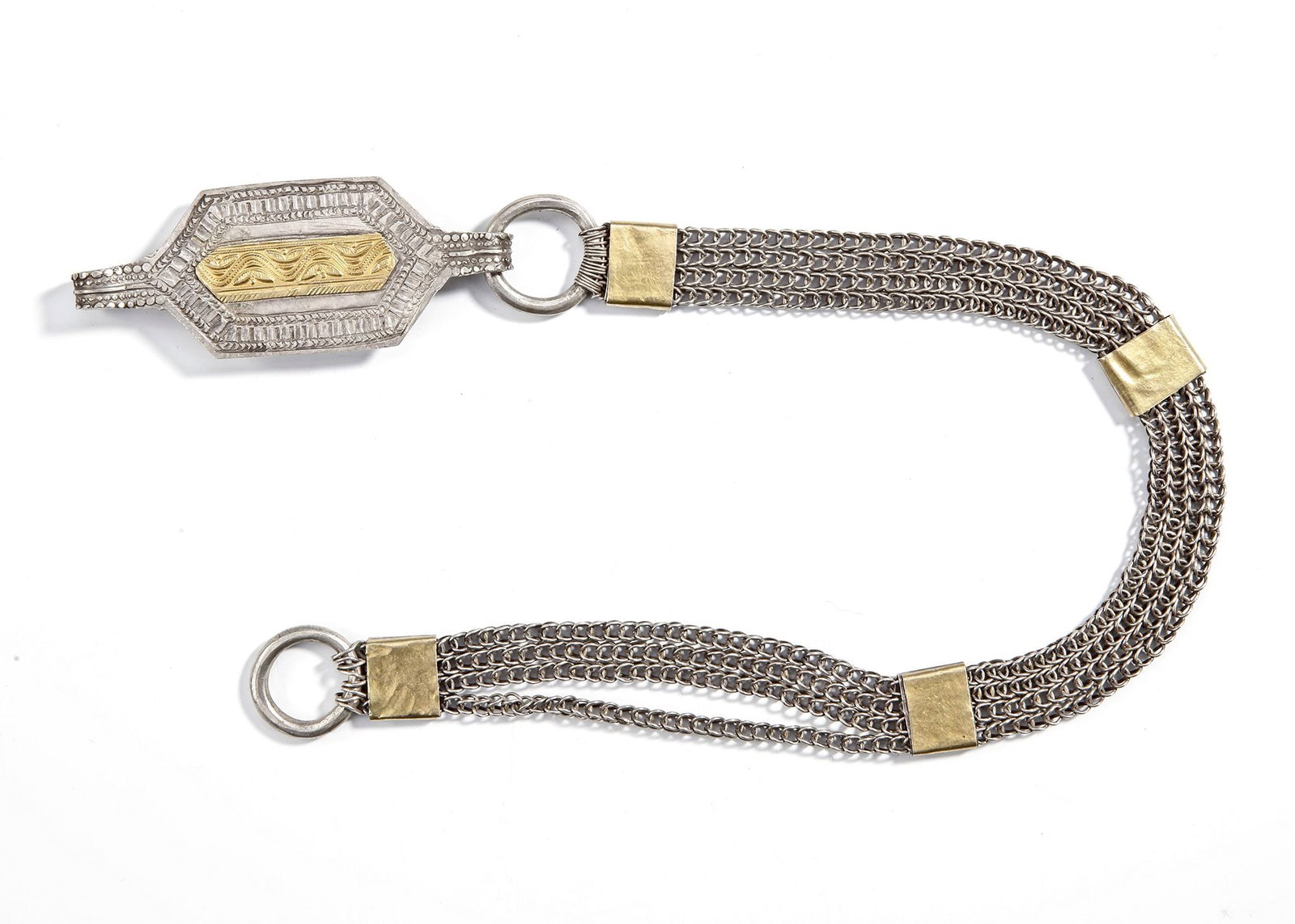 A SILVER BELT, OMAN, 19TH CENTURY: With multiple chain strands linked by rectangular gold-plated connectors. The central clasp is finely engraved with geometric and wave motifs, highlighted with gilt details. 55 cm. 143 gr.THE DR. SAAD
