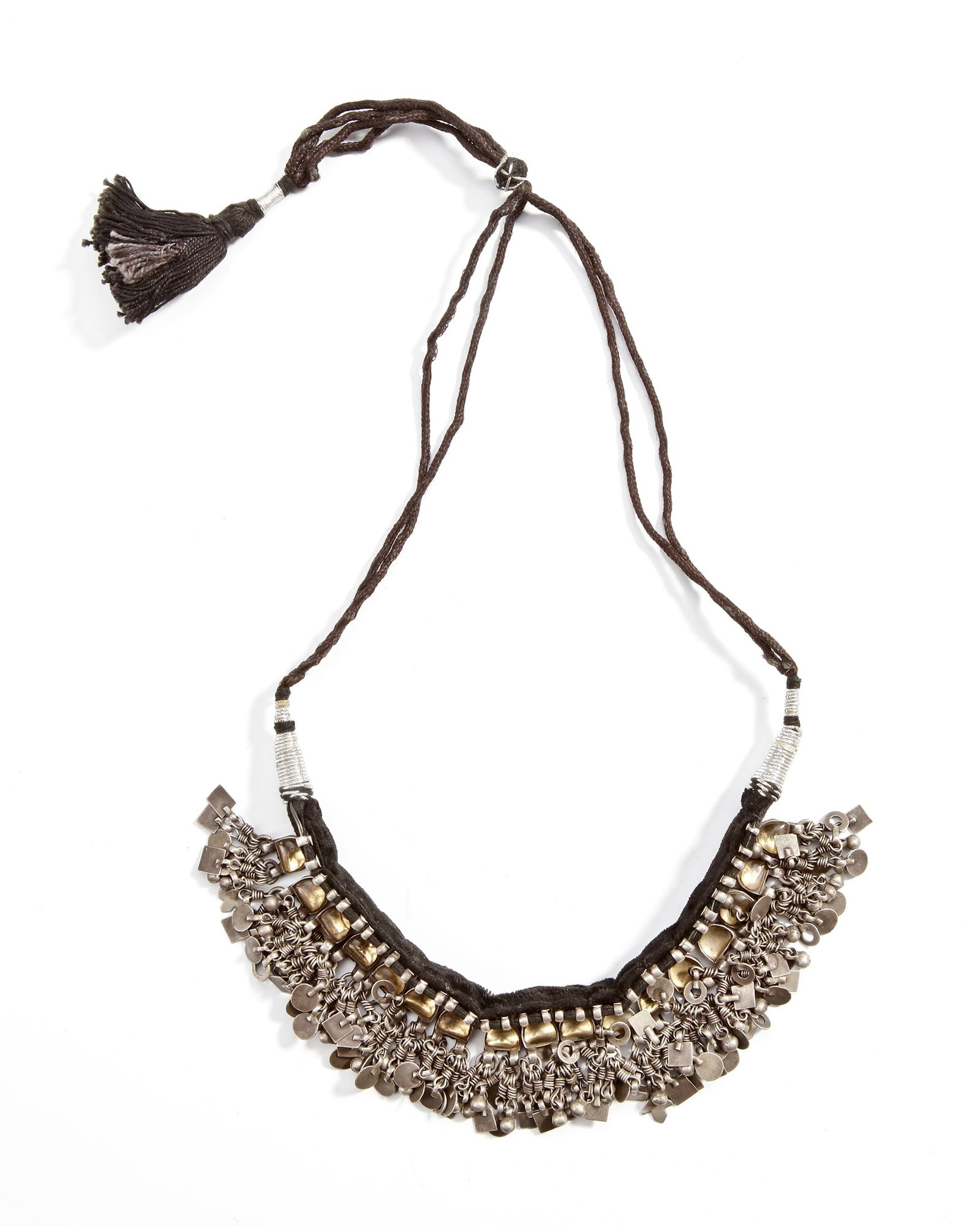 A SILVER NECKLACE, INDIA, 20TH CENTURY: With rows of yellow glass insets, set in silver and richly decorated with dangling chains and charms. 20 cm. 128 gr. THE DR. SAAD AL-JADIR COLLECTION