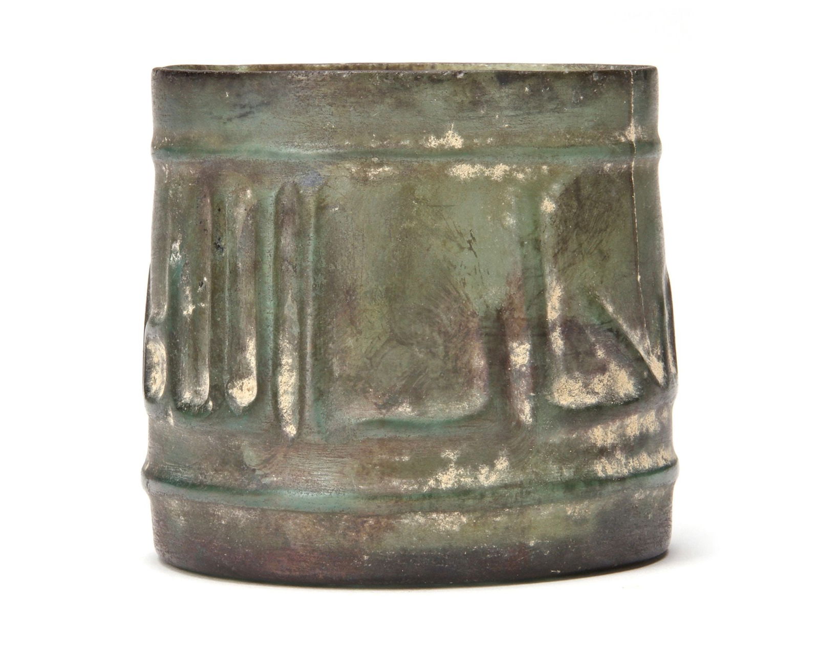 AN ISLAMIC GLASS BEAKER, NEAR EAST, 10TH-11TH CENTURY: Of cylindrical form, decorated around the body with a band of calligraphy between two rings at the rim and the base. Inscriptions: in large kufic script '' Subhan Allahi wa bihamdihi (Glory and praise
