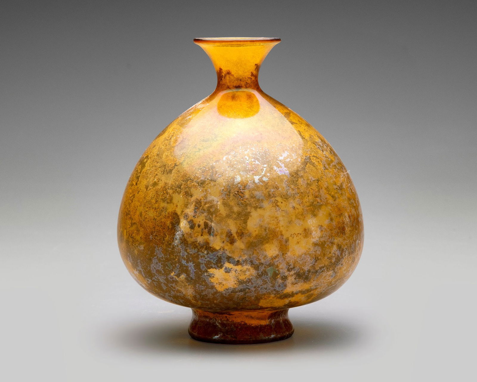 AN AMBER GLASS VESSEL, PERSIA, 10THâ€“11TH CENTURY (1 of 5)