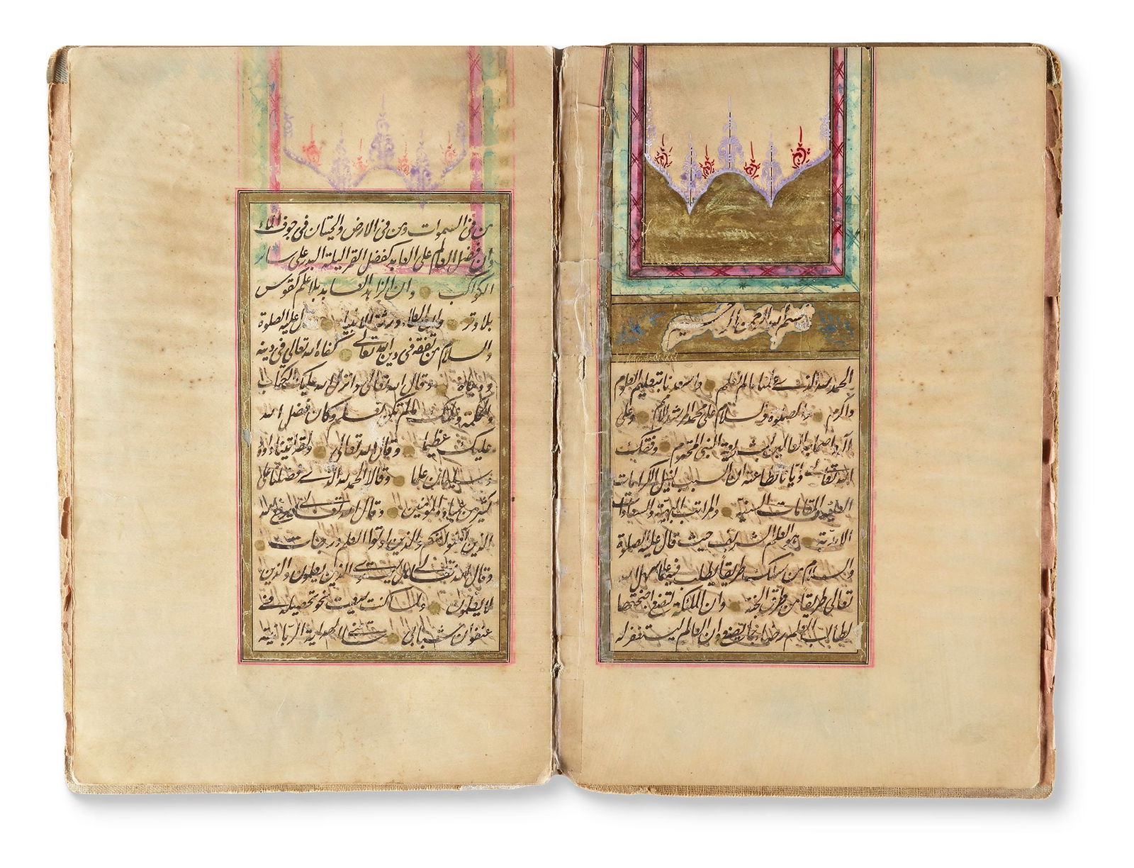 AN OTTOMAN MANUSCRIPT, WRITTEN BY IBRAHIM HAKKI EFENDI, TURKEY, AND DATED 1323 AH/1905 AD: An Arabic manuscript on paper, comprising 7 folios, with 14 lines of text per page. The text is written in black Taliq script, framed by intricate gilt and polychrome borders, with gold roundel verse