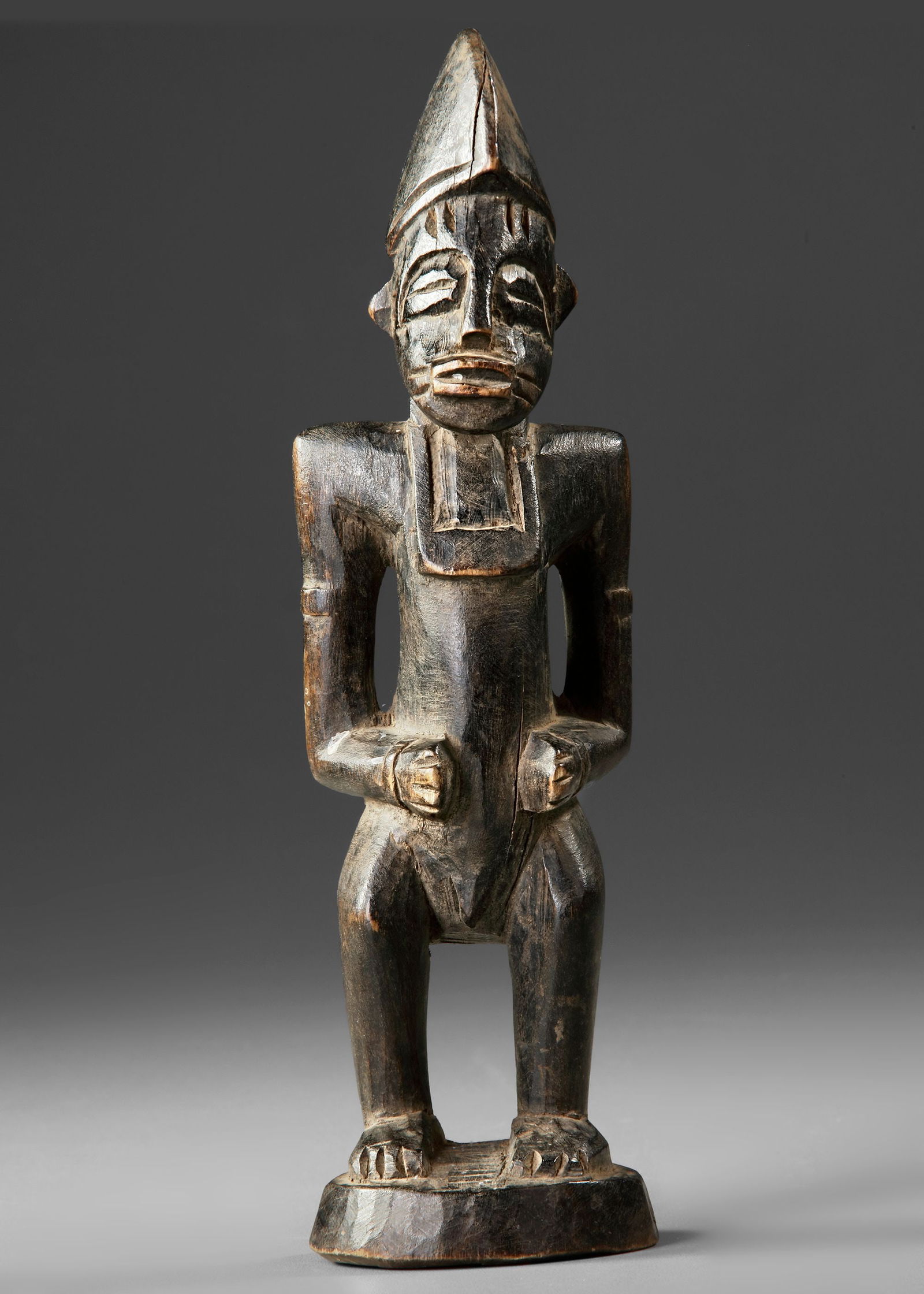 A SMALL SENOUFO FIGURE (1 of 6)