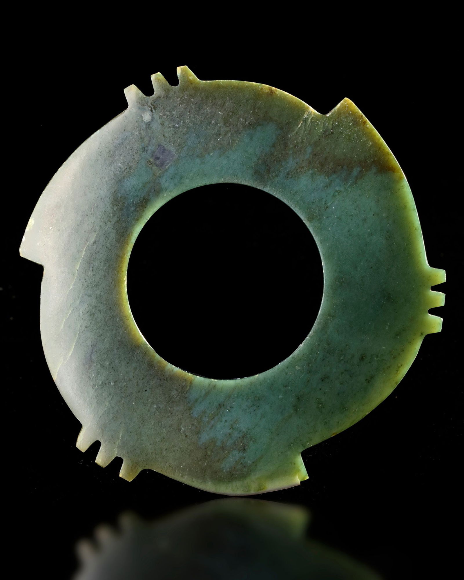 A CHINESE NEOLITHIC JADE BI DISC (1 of 3)
