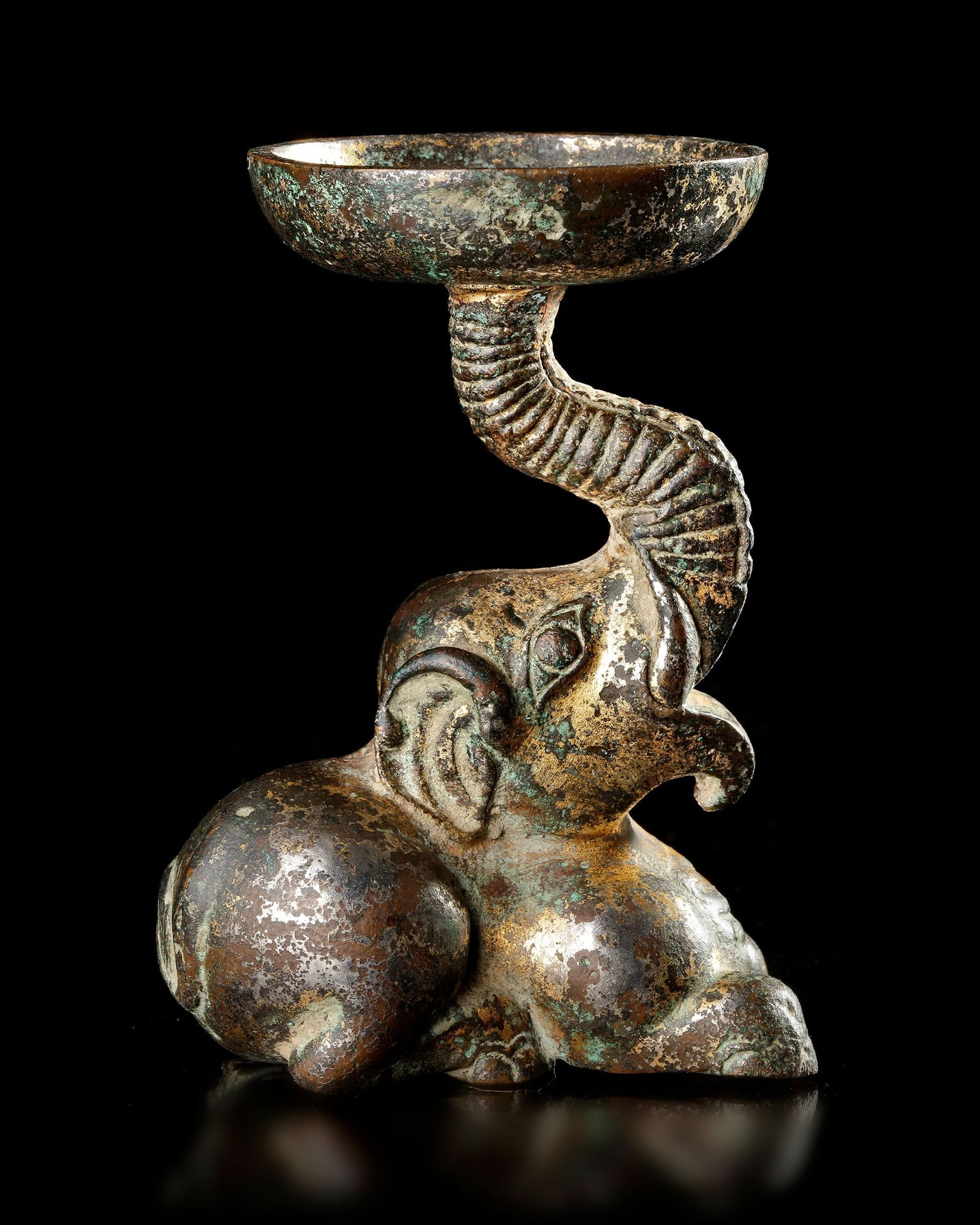 A BRONZE ELEPHANT OIL LAMP, HAN DYNASTY (206 BC-220 AD) (1 of 5)