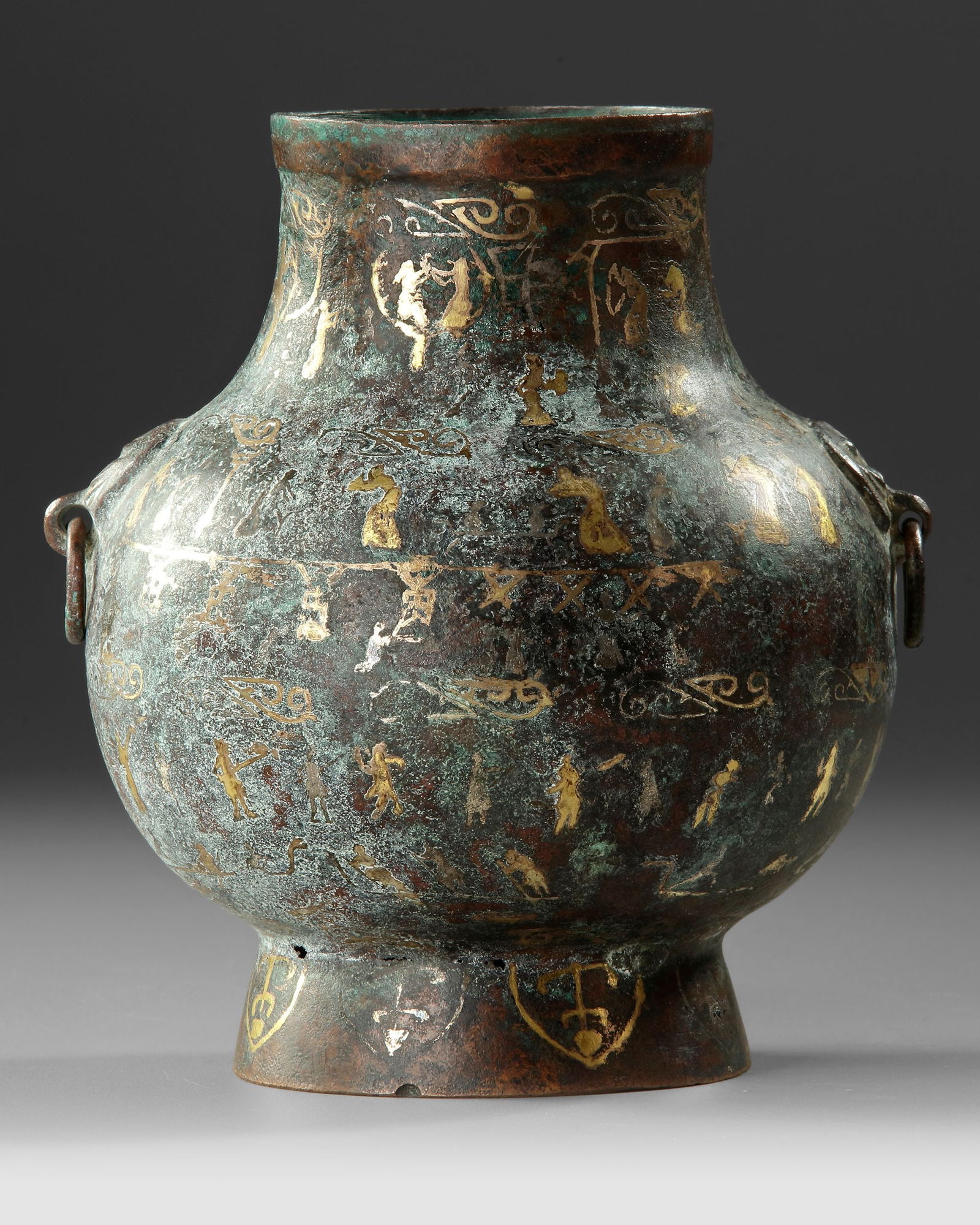 A GOLD AND SILVER INLAID BRONZE AMPHORA, CHINA, WARRING STATES PERIOD (475â€“221 BC).: Rare Chinese bronze funerary amphora cast in a high-copper alloy, richly decorated with intricate gold and silver inlay. The vessel is covered with finely detailed motifs including geometric patterns,