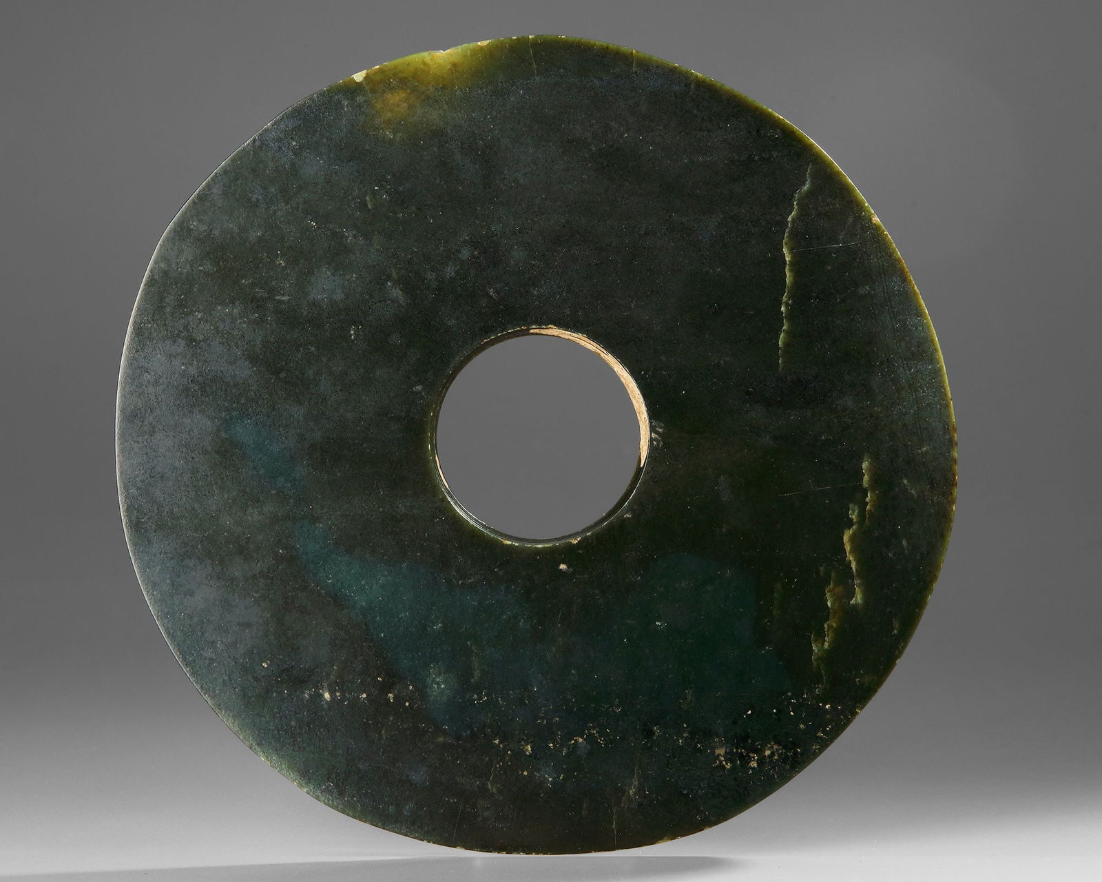 A NEOLITHIC JADE BI DISC, CHINA (1 of 3)