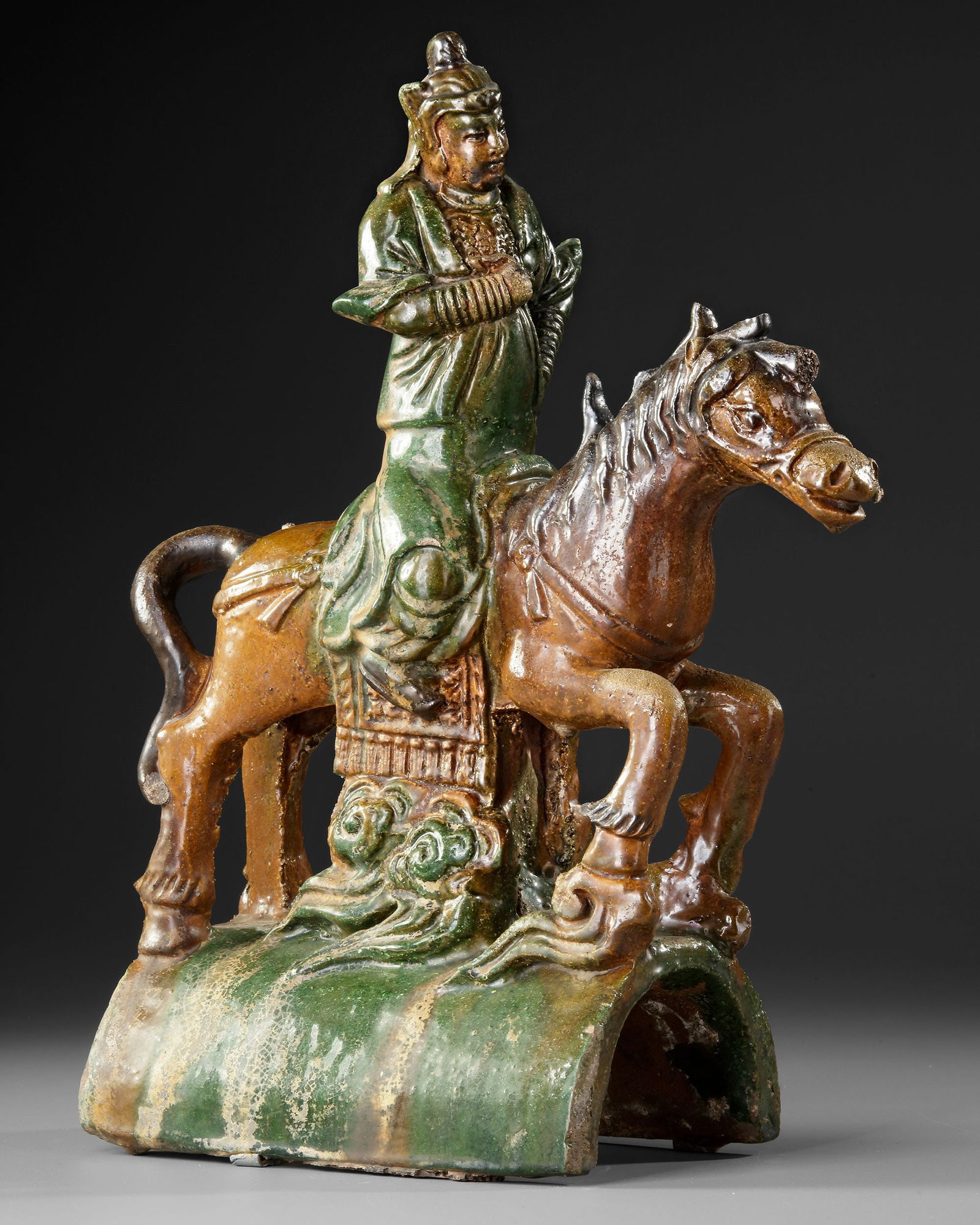 A GLAZED ROOFTILE, CHINA, MING DYNASTY (1368-1644): 37 by 27 cm.Provenance: Private collection, Belgium.