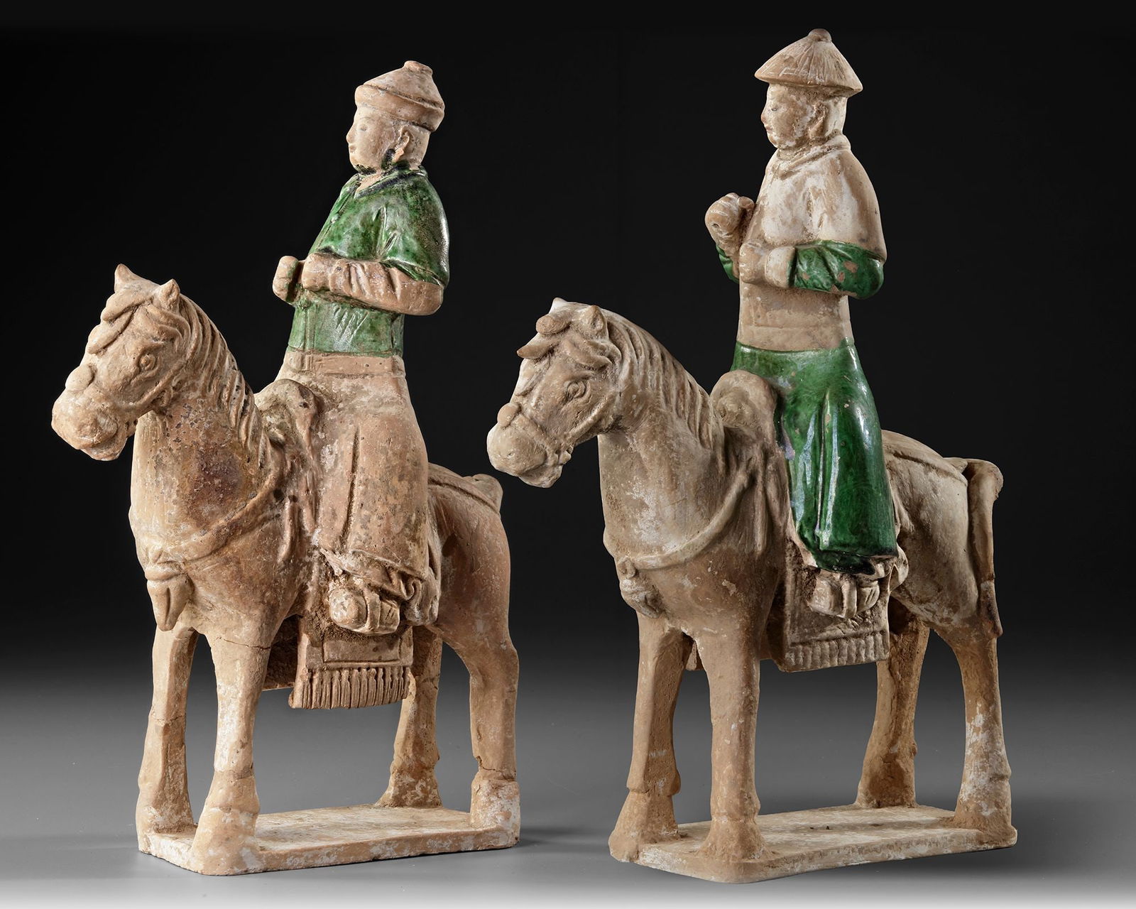 A PAIR OF RIDERS ON HORSES, MING DYNASTY (1368-1644): ca. 37 by 27 cm.Provenance: Private collection, The Netherlands.