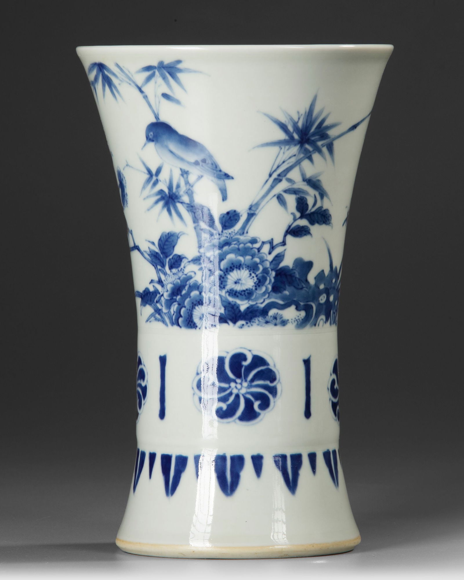 A CHINESE TRANSITIONAL STYLE BLUE AND WHITE BEAKER GU VASE (1 of 4)