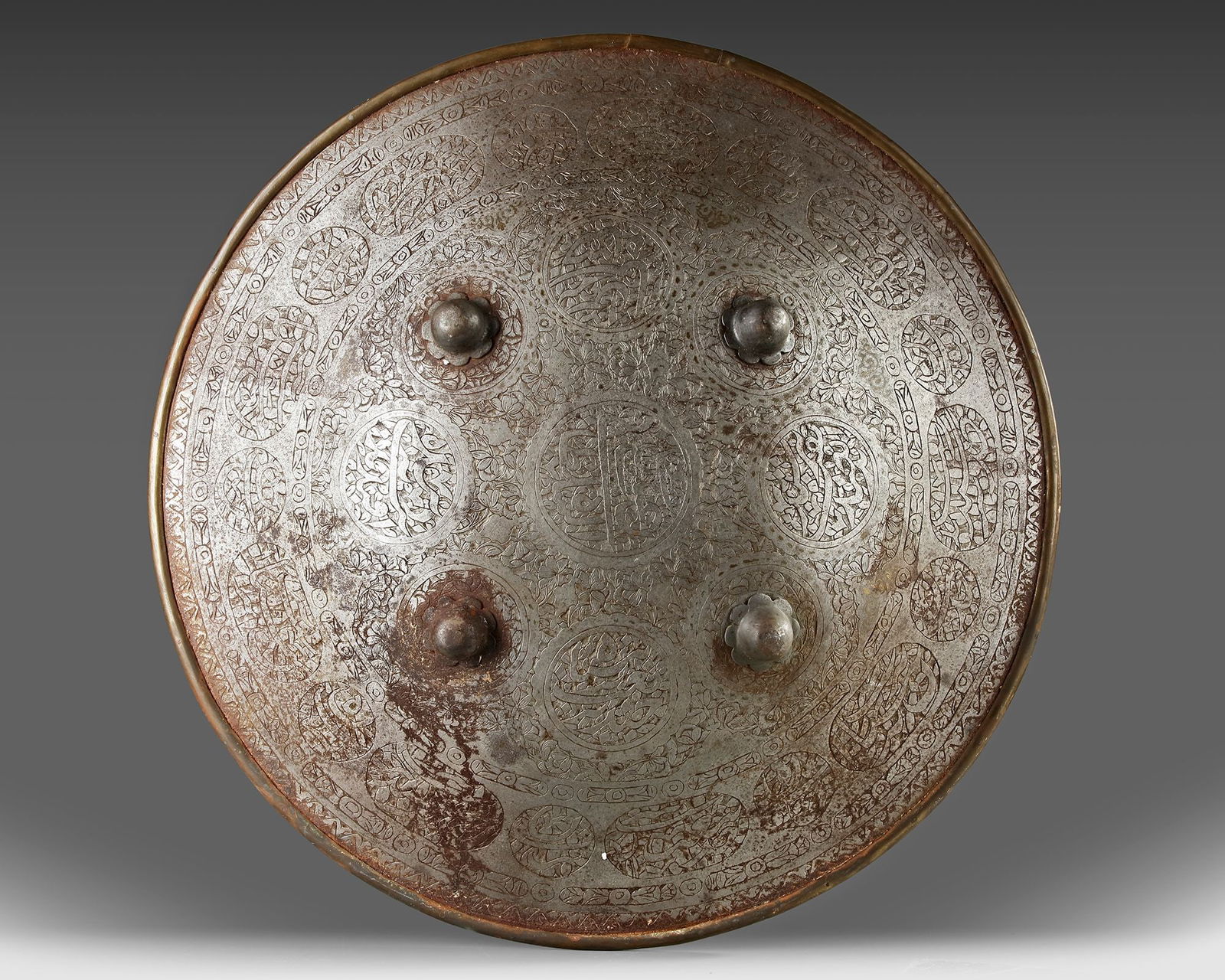 A QAJAR DAMASCENED SHIELD, PERSIA 19TH CENTURY (1 of 3)