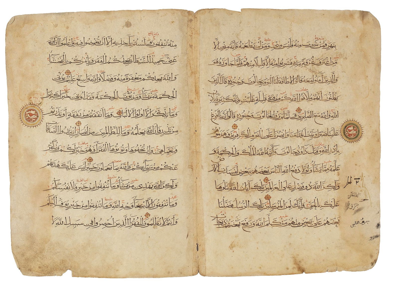 TWO QURAN PAGES, NEAR EAST, 14TH CENTURY: Arabic manuscript on paper, 2 leaves with 11 lines to each page, written in elegant black Muhaqqaq script, gold verse markers outlined in black and red dots, Al-tajwid and diacritics in red ink, occas