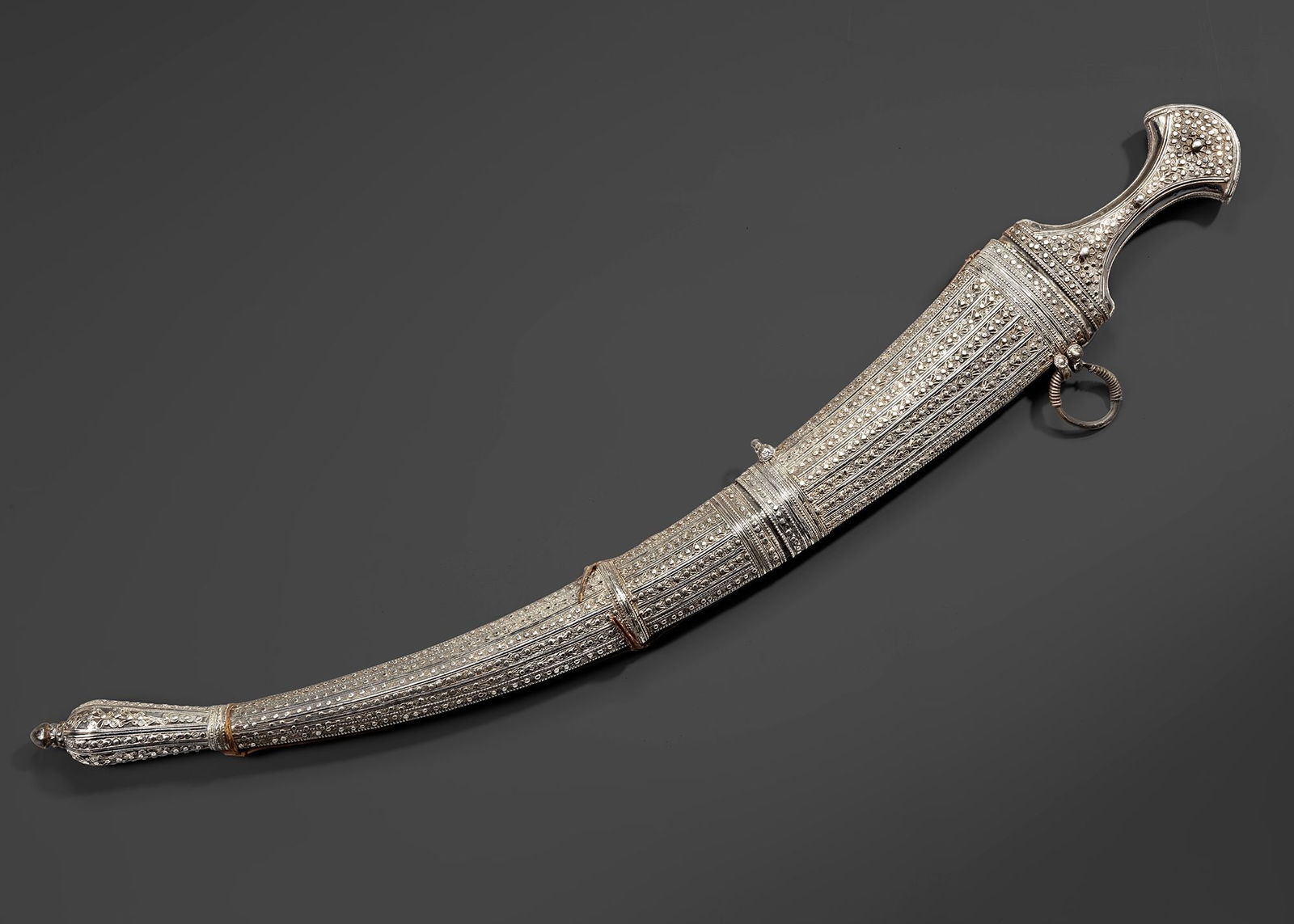 A LARGE SILVER YEMENI DAGGER (JANBIYA) EARLY 20TH CENTURY (1 of 3)