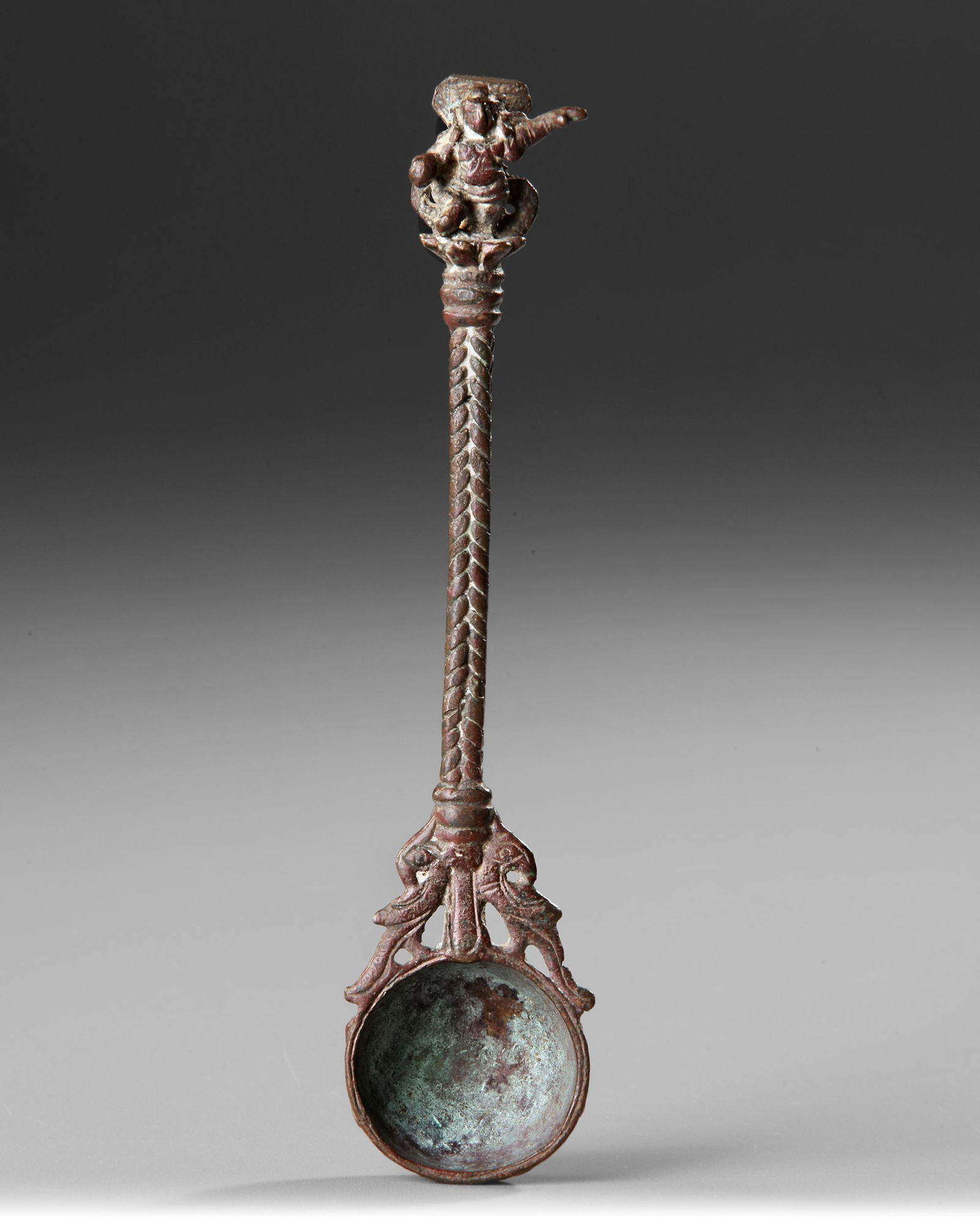 A HOLY INDIAN SPOON, LATE 16TH CENTURY: L. 15 cm.