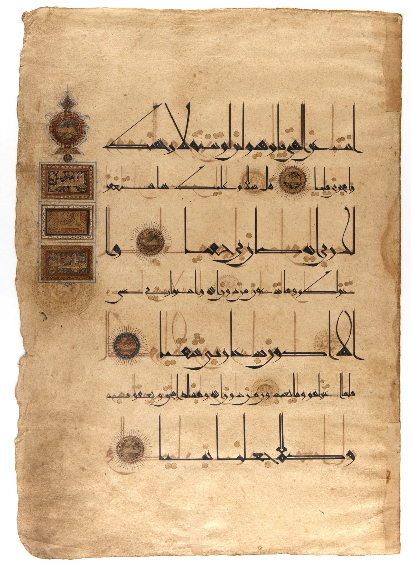 A QURAN LEAF IN EASTERN KUFIC SCRIPT ON PAPER, PERSIA, 11TH-12TH CENTURY (1 of 2)