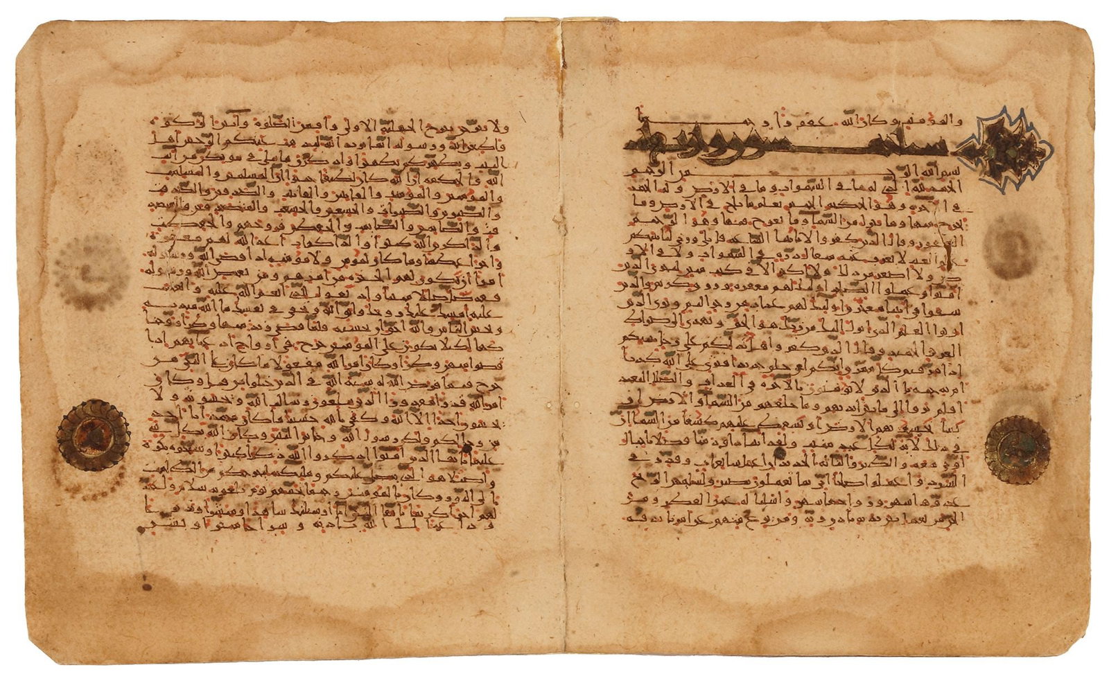 TWO QURAN PAGES IN EASTERN KUFIC, PERSIA, 11TH CENTURY (1 of 2)